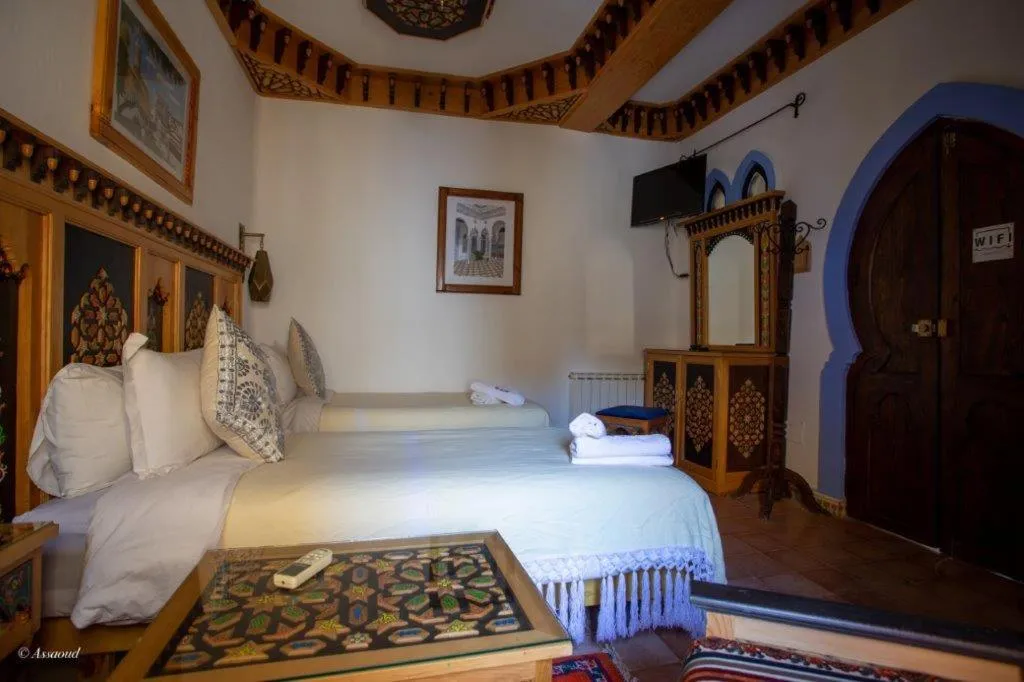 Bed in Hotel Dar Mounir