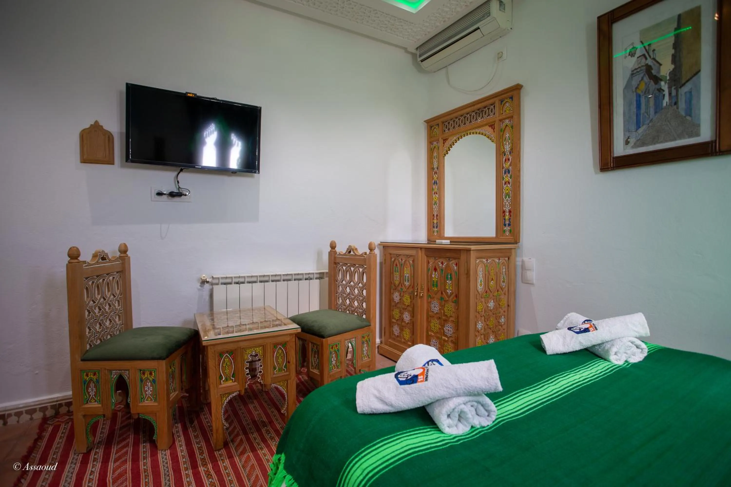 Bed in Hotel Dar Mounir