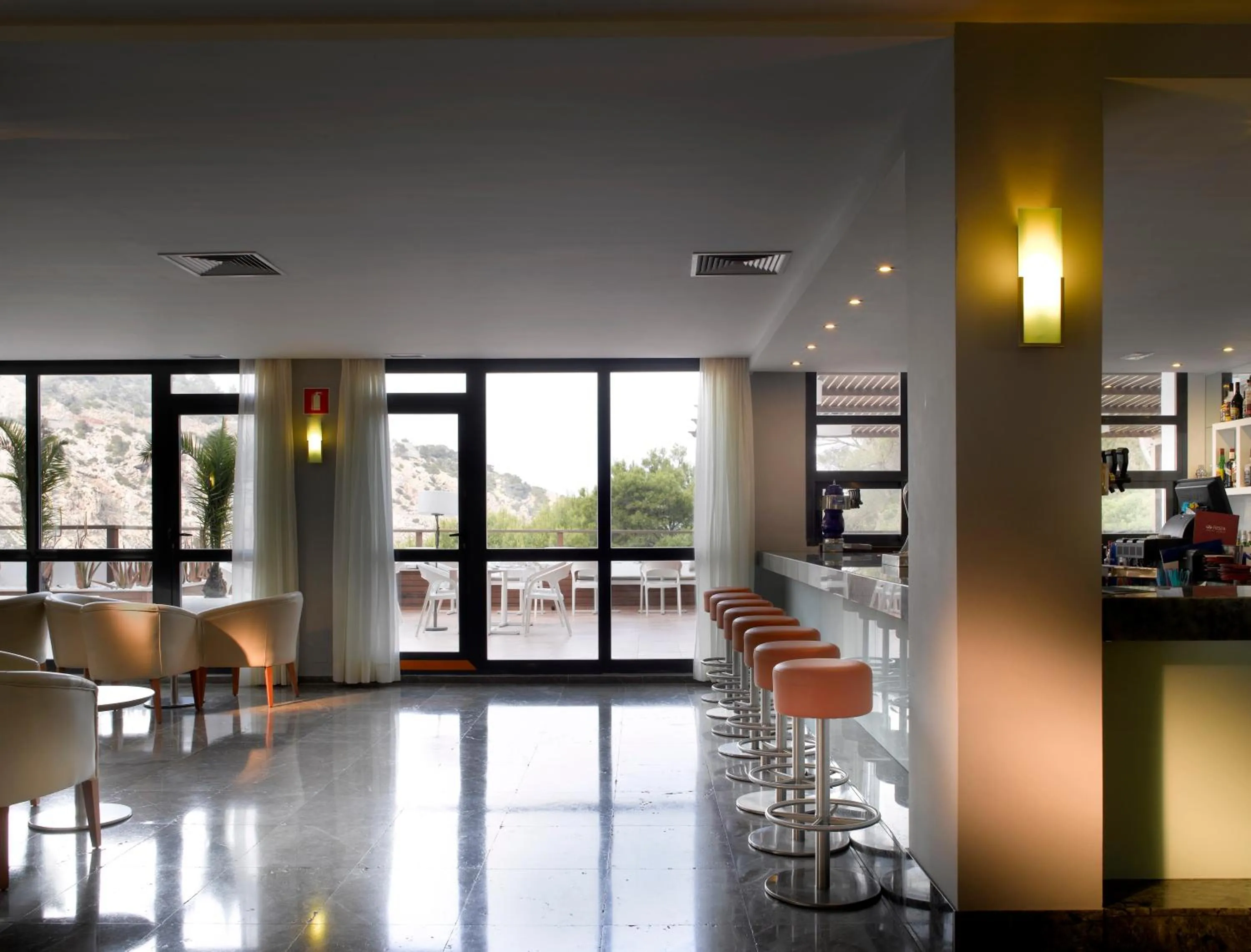 Lounge or bar in Palladium Hotel Cala Llonga - Adults Only