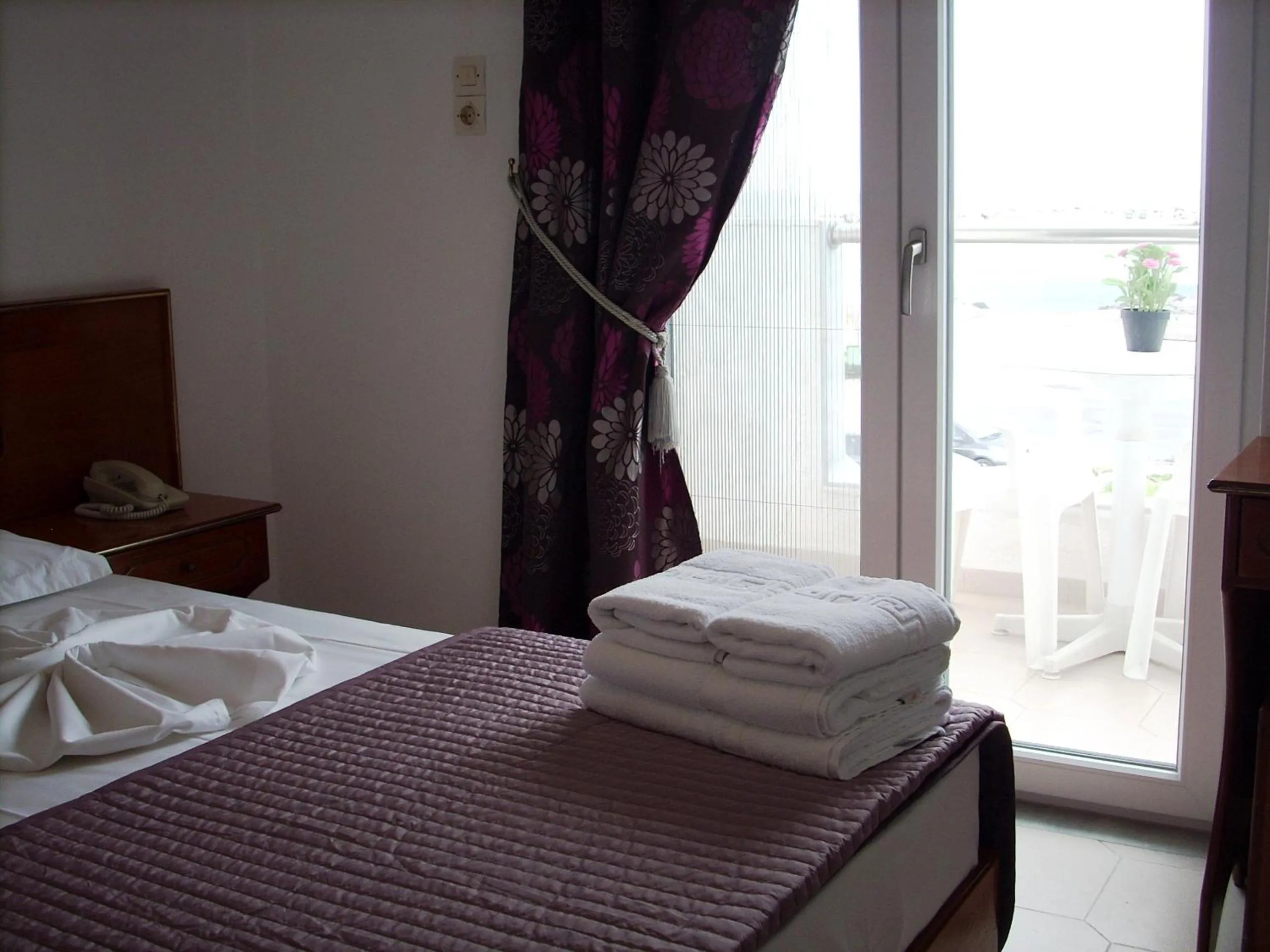 Bedroom, Bed in Sea Breeze Hotel