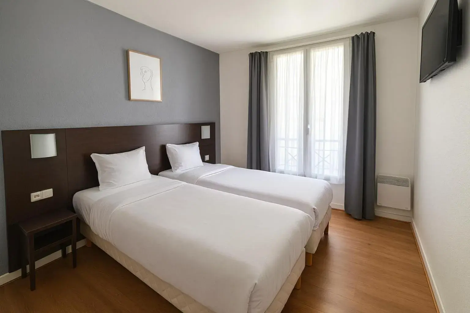 Twin Room in Hotel Arc Paris Porte d'Orléans Twin Room in Hotel Arc Paris Porte d'Orléans