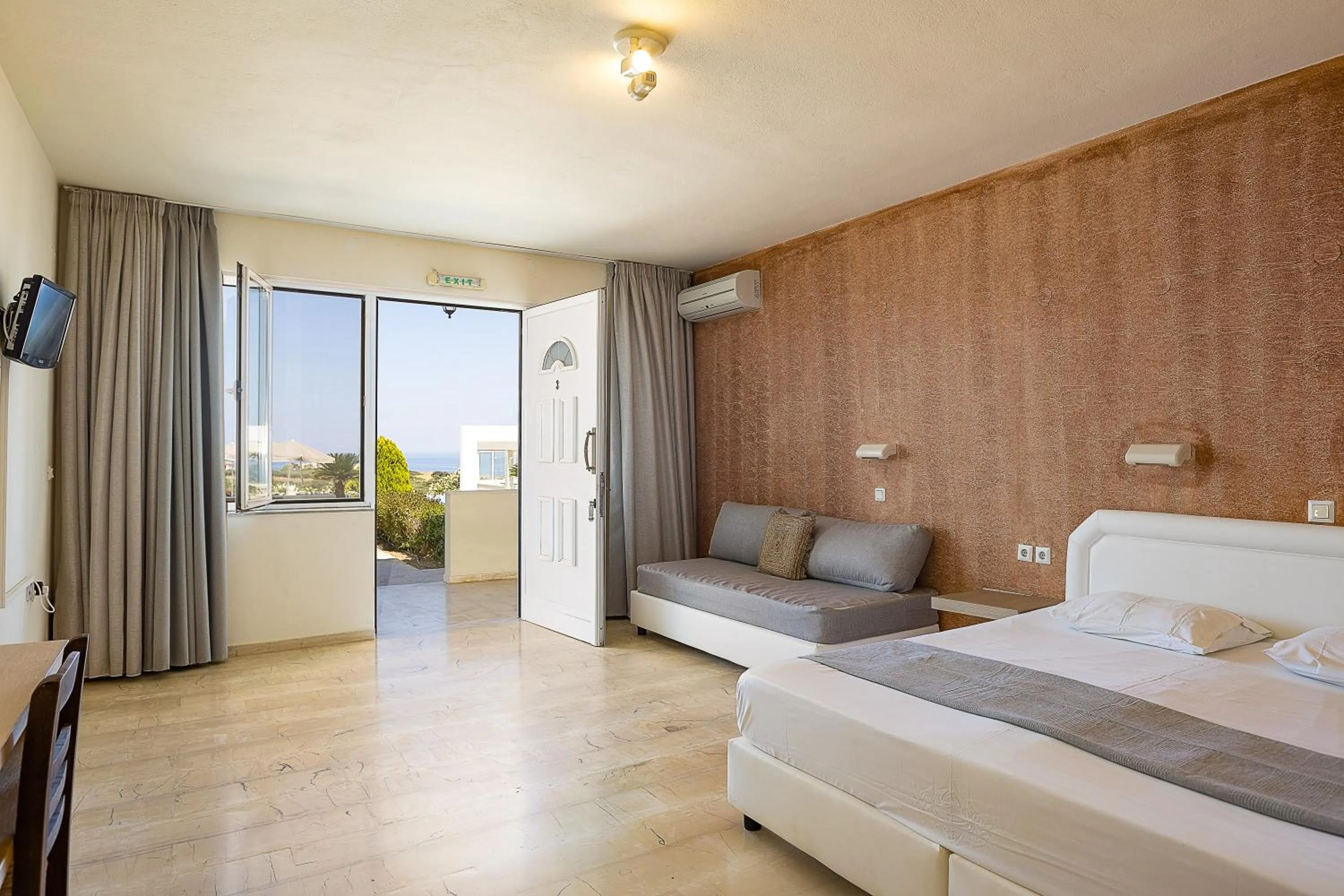 Bed in Lofos Panorama Apartments