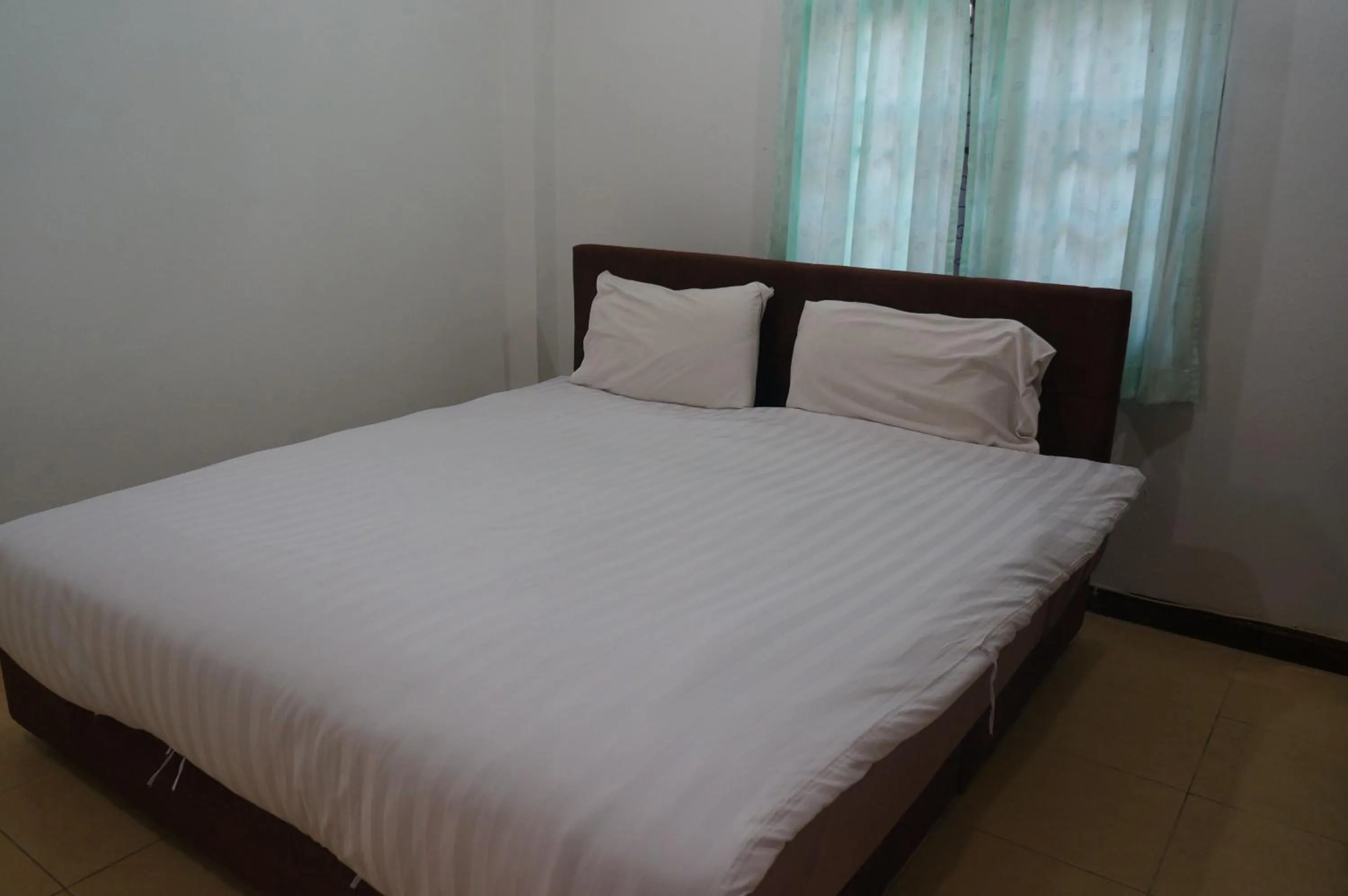 Bed in Lamai Apartment