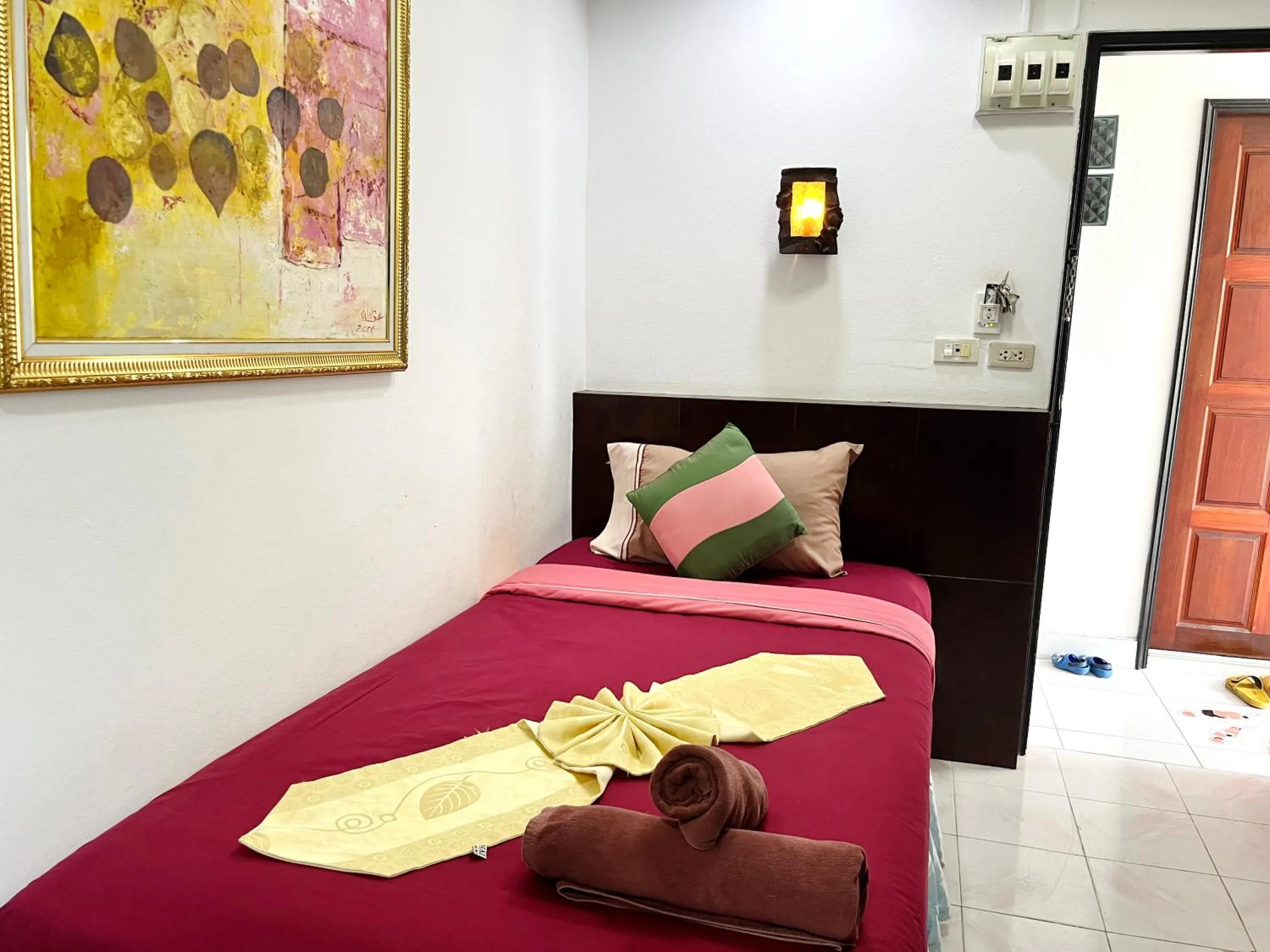 Bed in Lamai Apartment