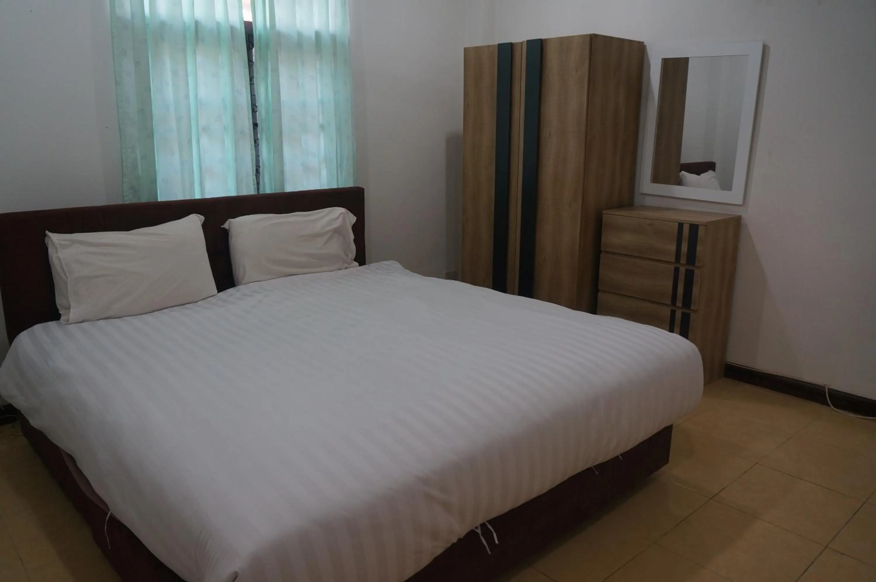 Bed in Lamai Apartment