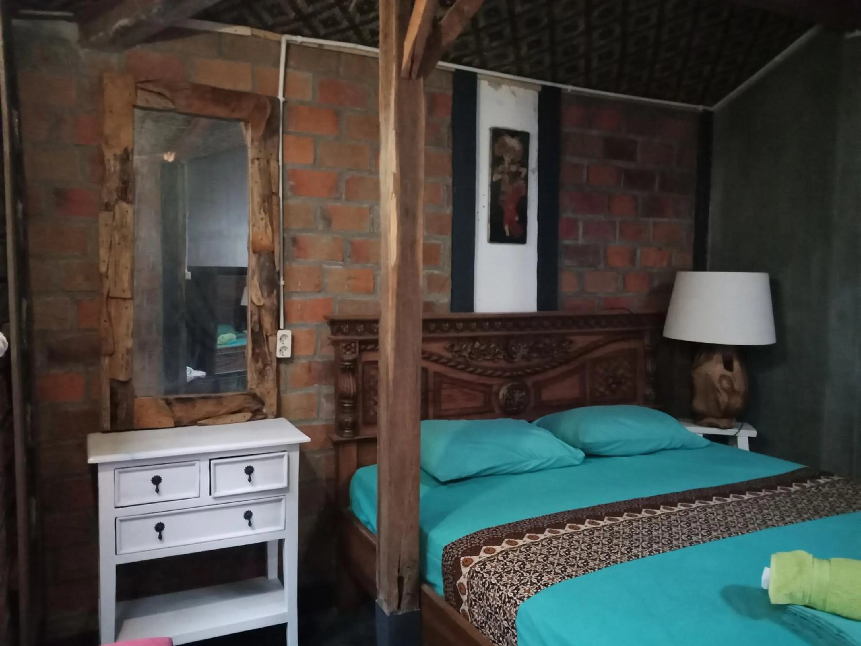 Bed in Arjuna Garden Homestay