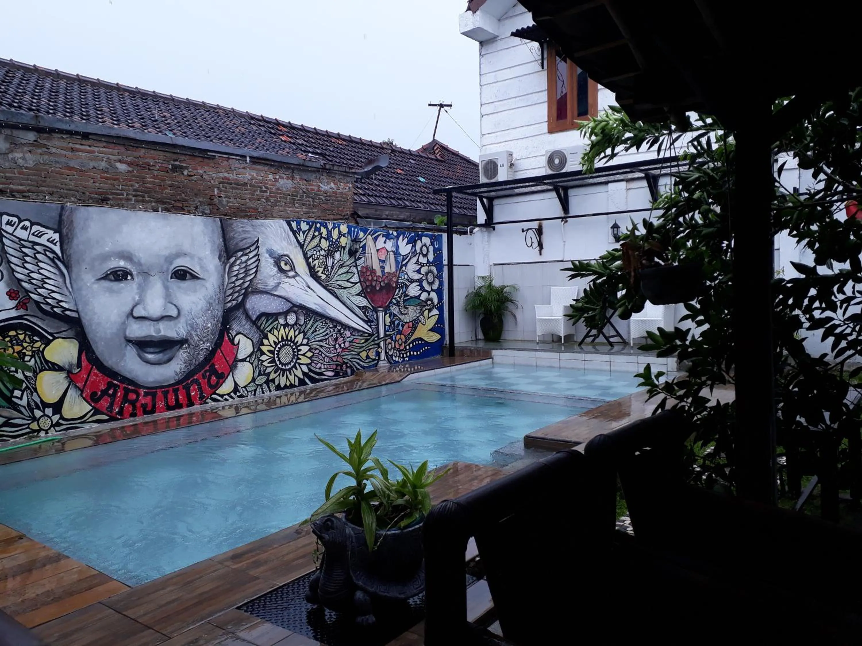 Swimming pool in Arjuna Garden Homestay