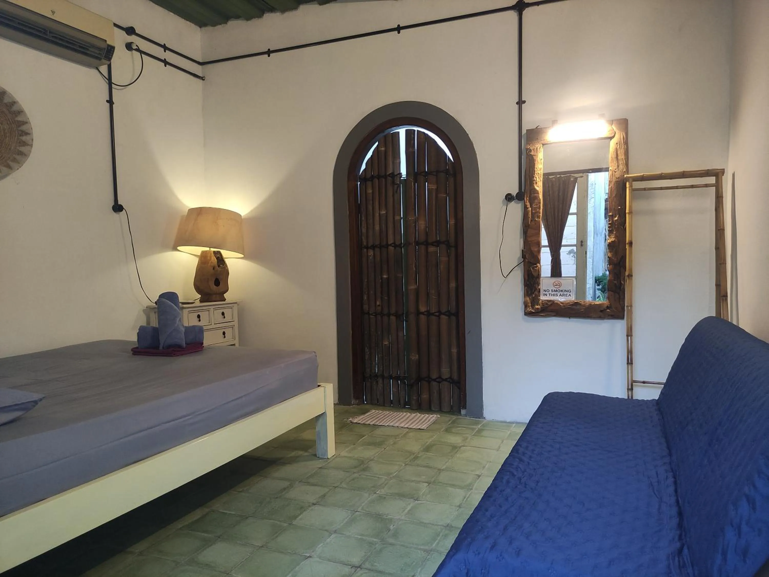 Bed in Arjuna Garden Homestay