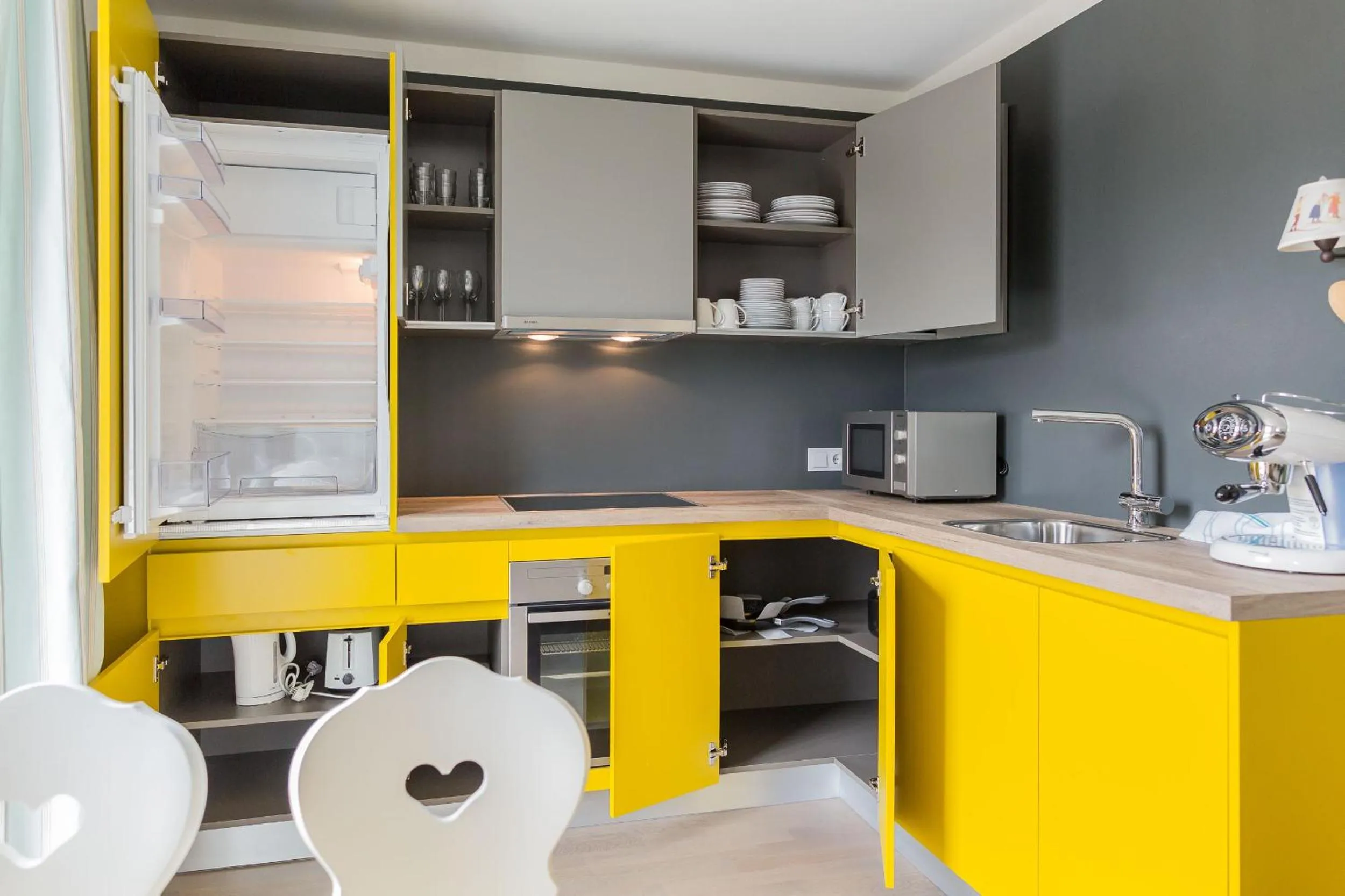 Kitchen or kitchenette in HOMEBOUND APARTMENTS Salzburg City II - contactless check-in