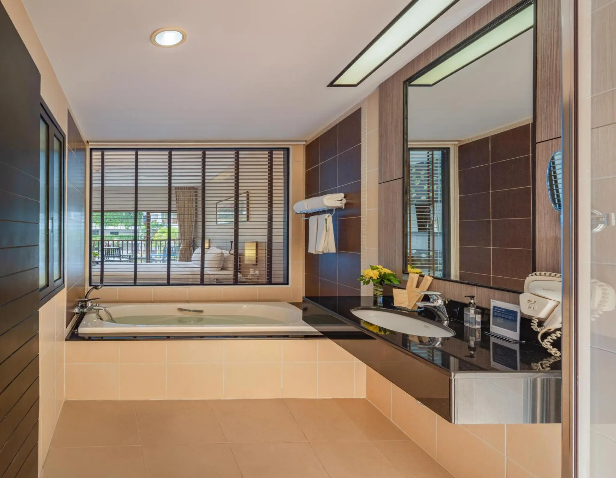 Bathroom in Deevana Plaza Phuket - SHA Extra Plus