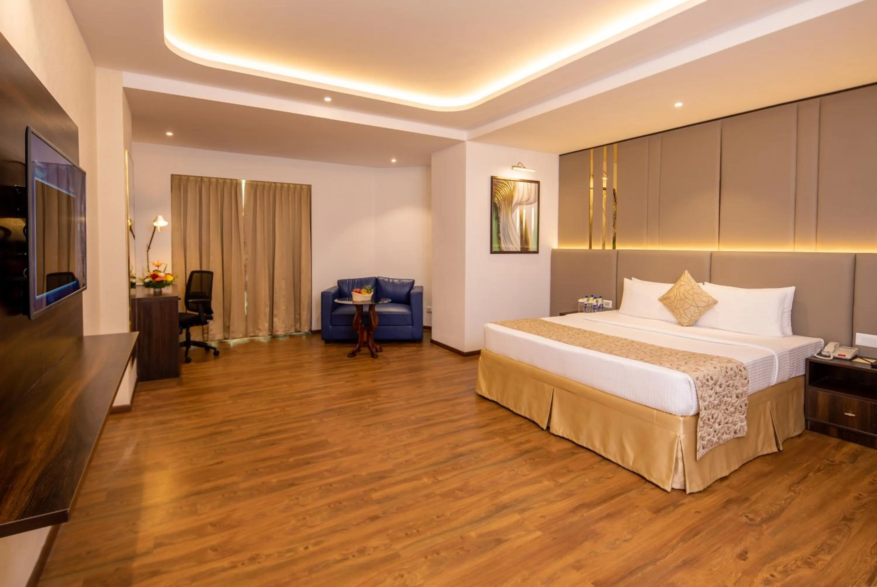 Photo of the whole room, Bed in Goldfinch Hotel Bangalore