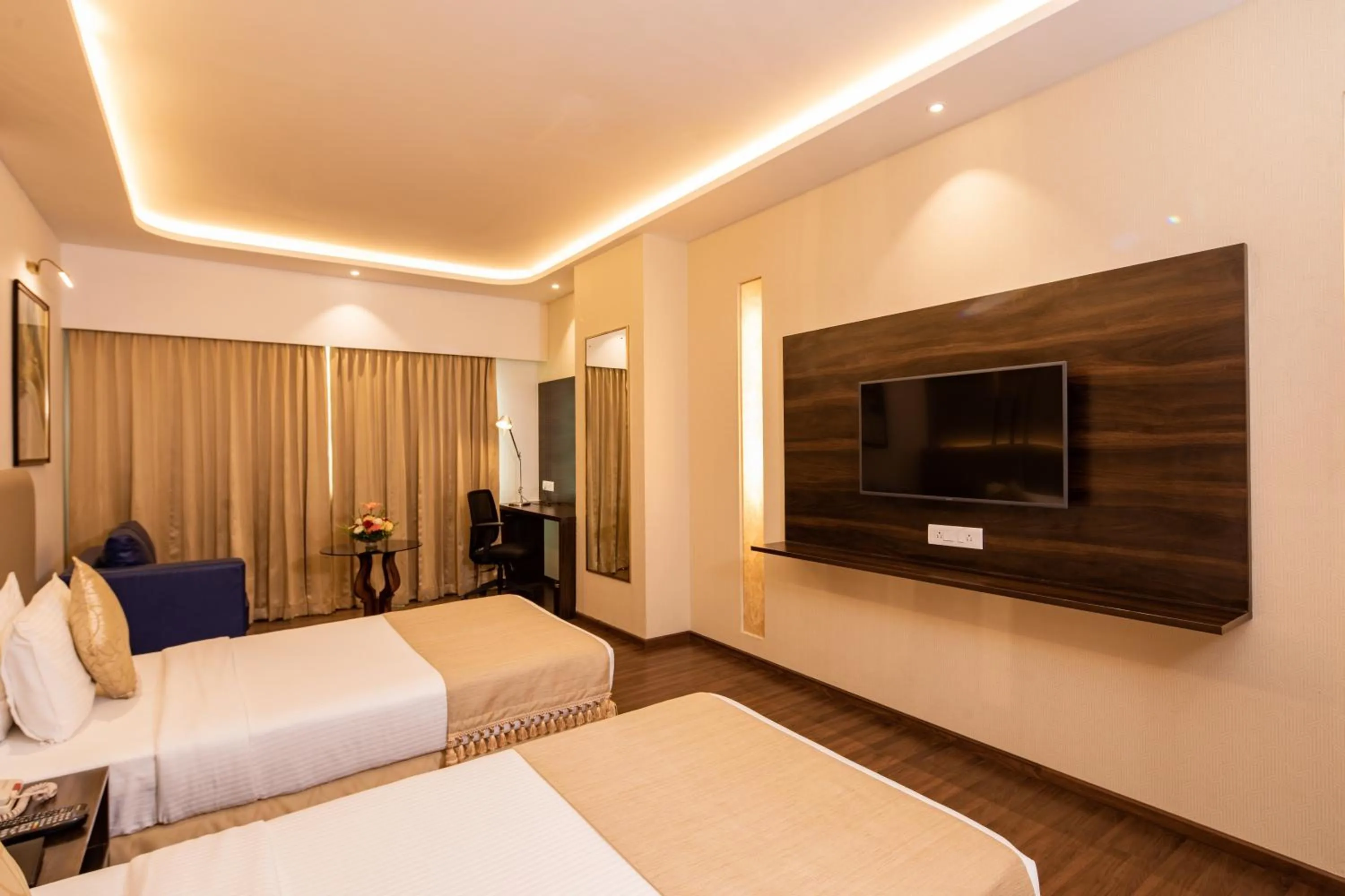 Photo of the whole room, Bed in Goldfinch Hotel Bangalore