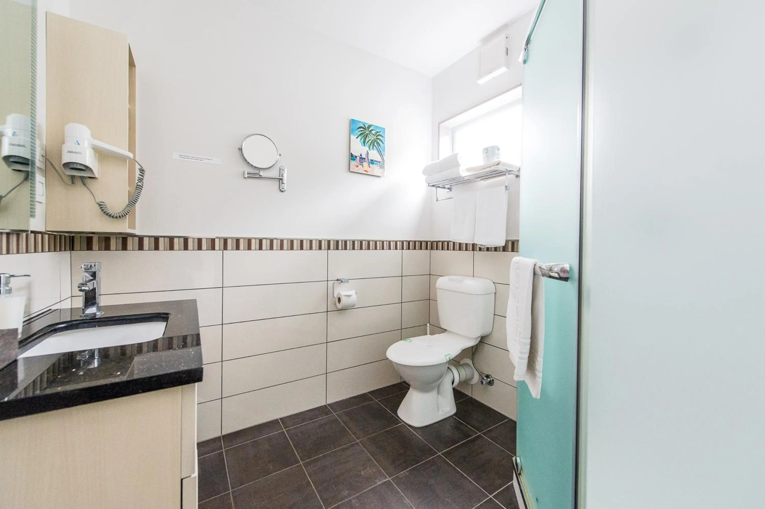 Bathroom in 151 On London Motel & Conference Centre