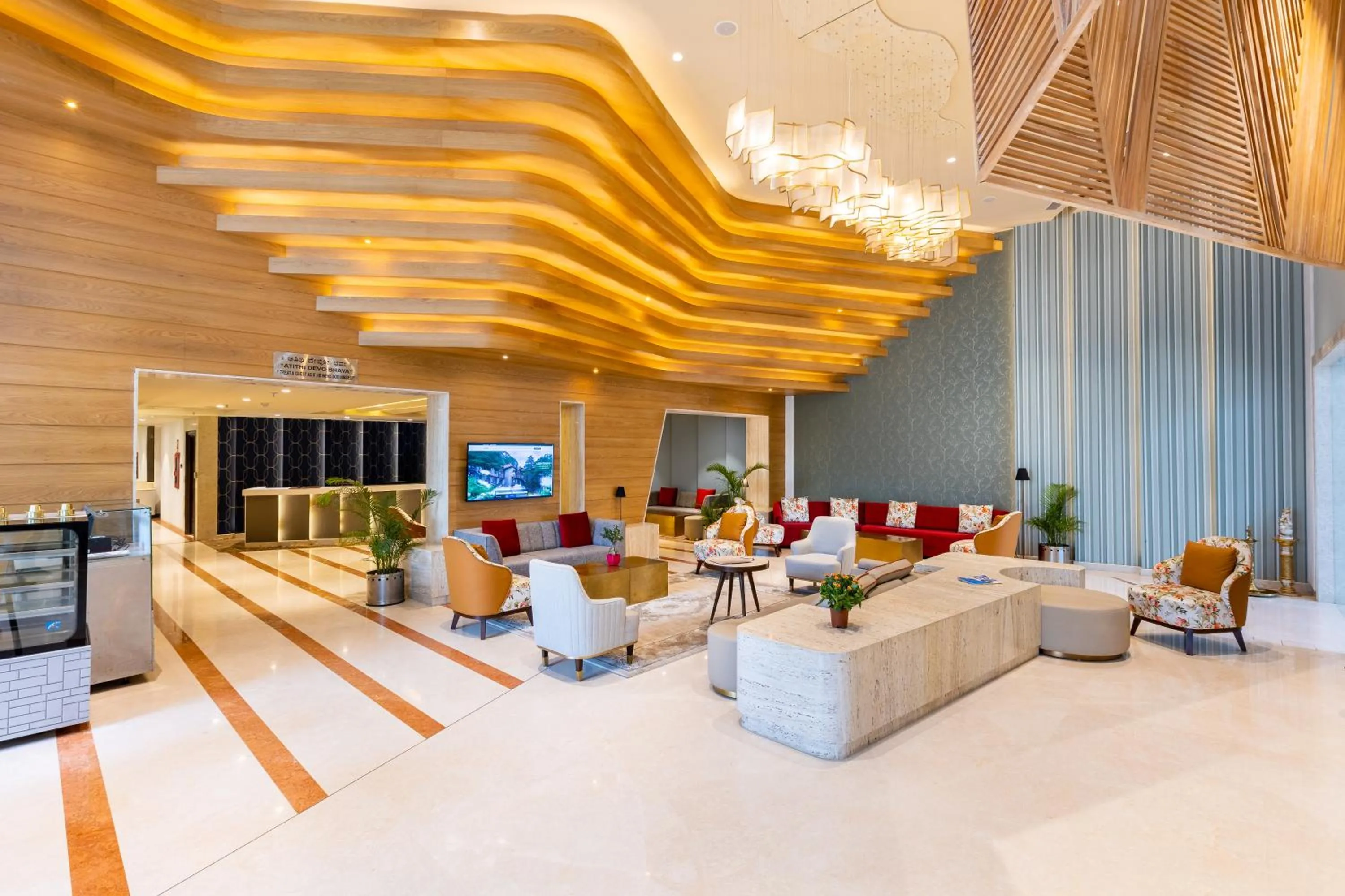 Lobby or reception in Citadel Sarovar Portico Bengaluru