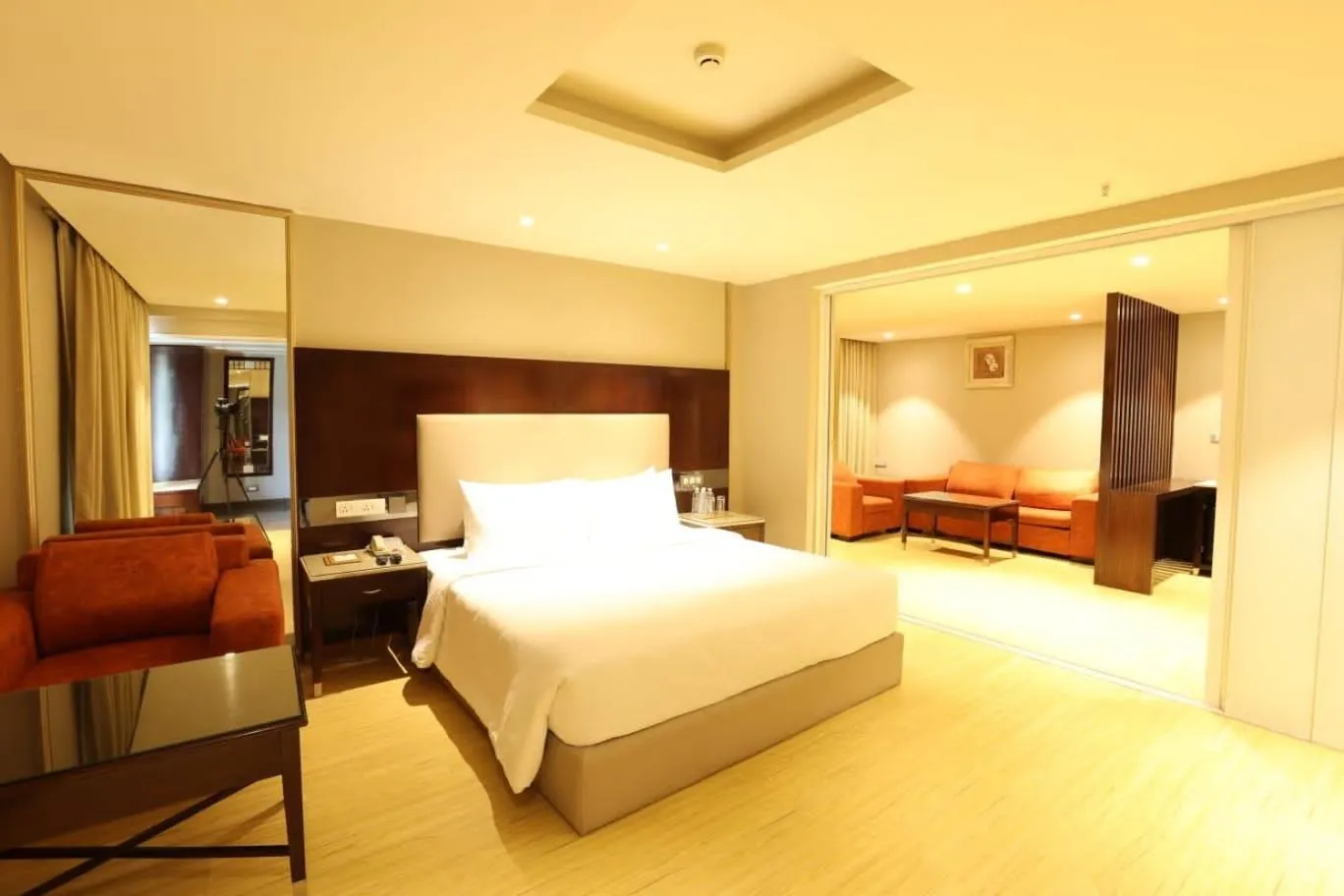 Bedroom, Bed in Citadel Sarovar Portico Bengaluru