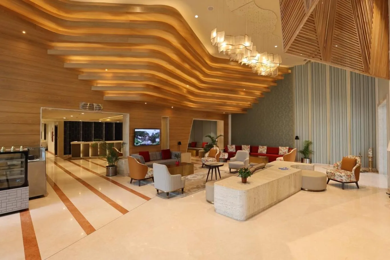 Lobby or reception in Citadel Sarovar Portico Bengaluru
