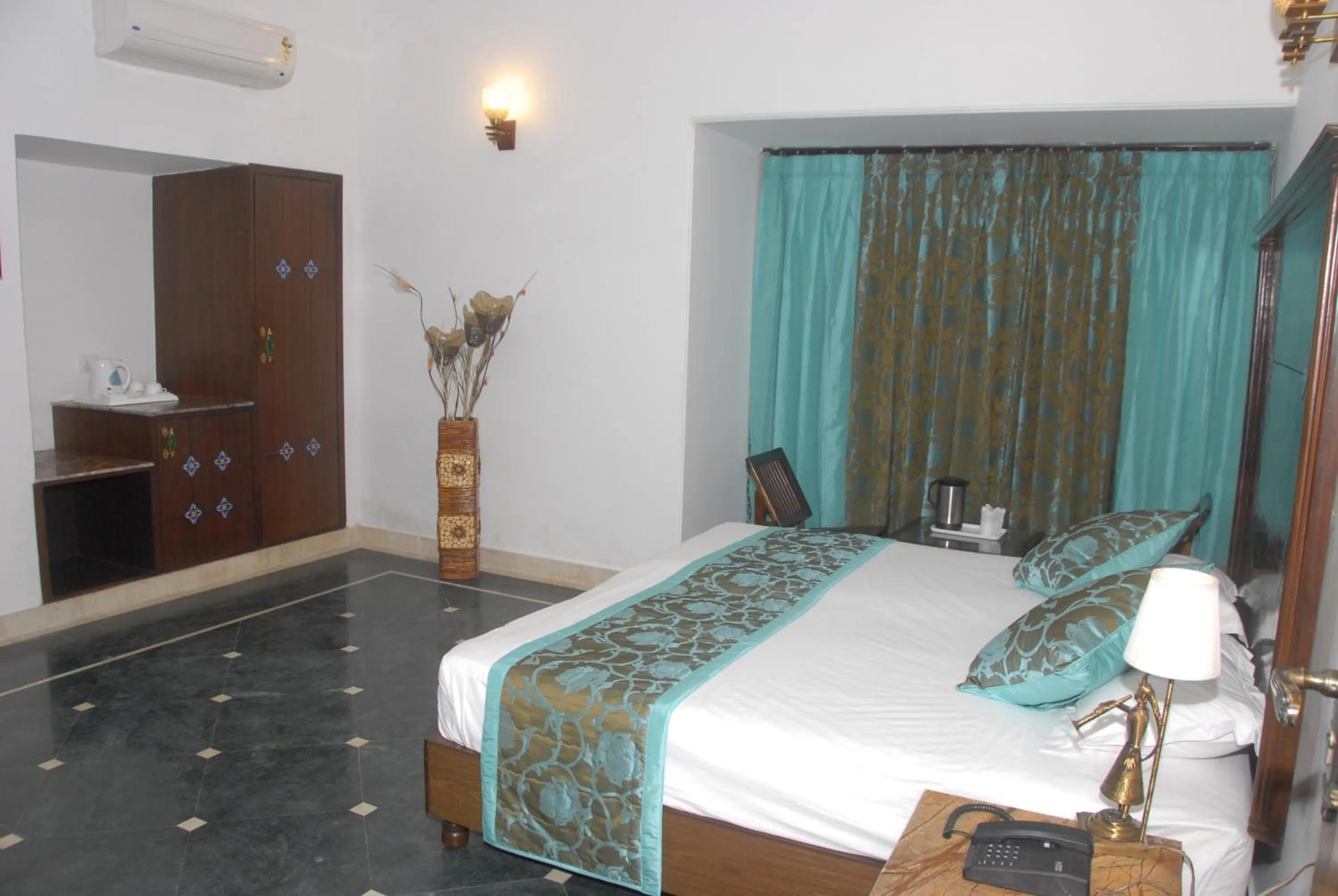Photo of the whole room, Bed in Nahargarh Haveli-Near Train station Metro
