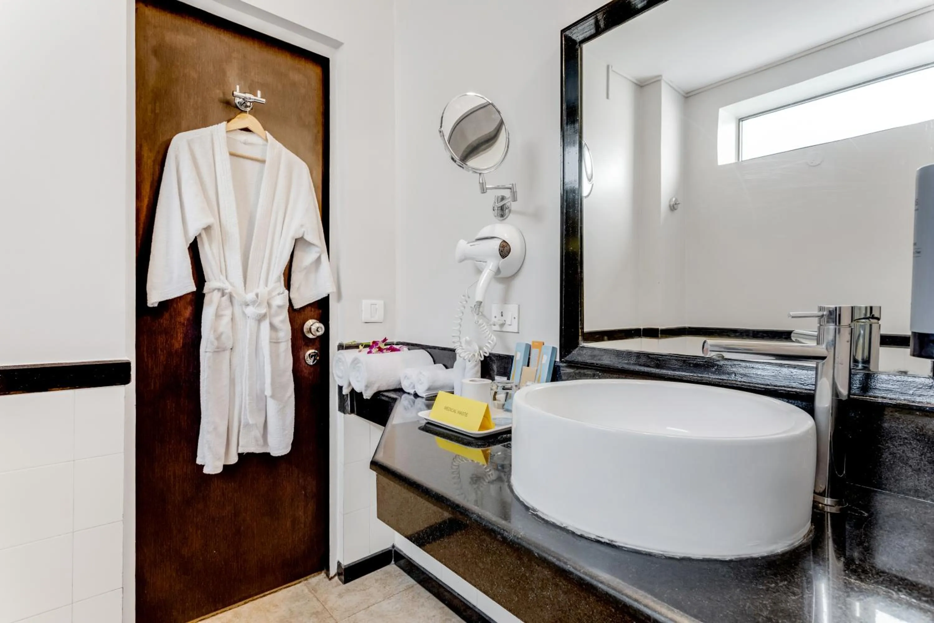 Bathroom in Whispering Palms Beach Resort