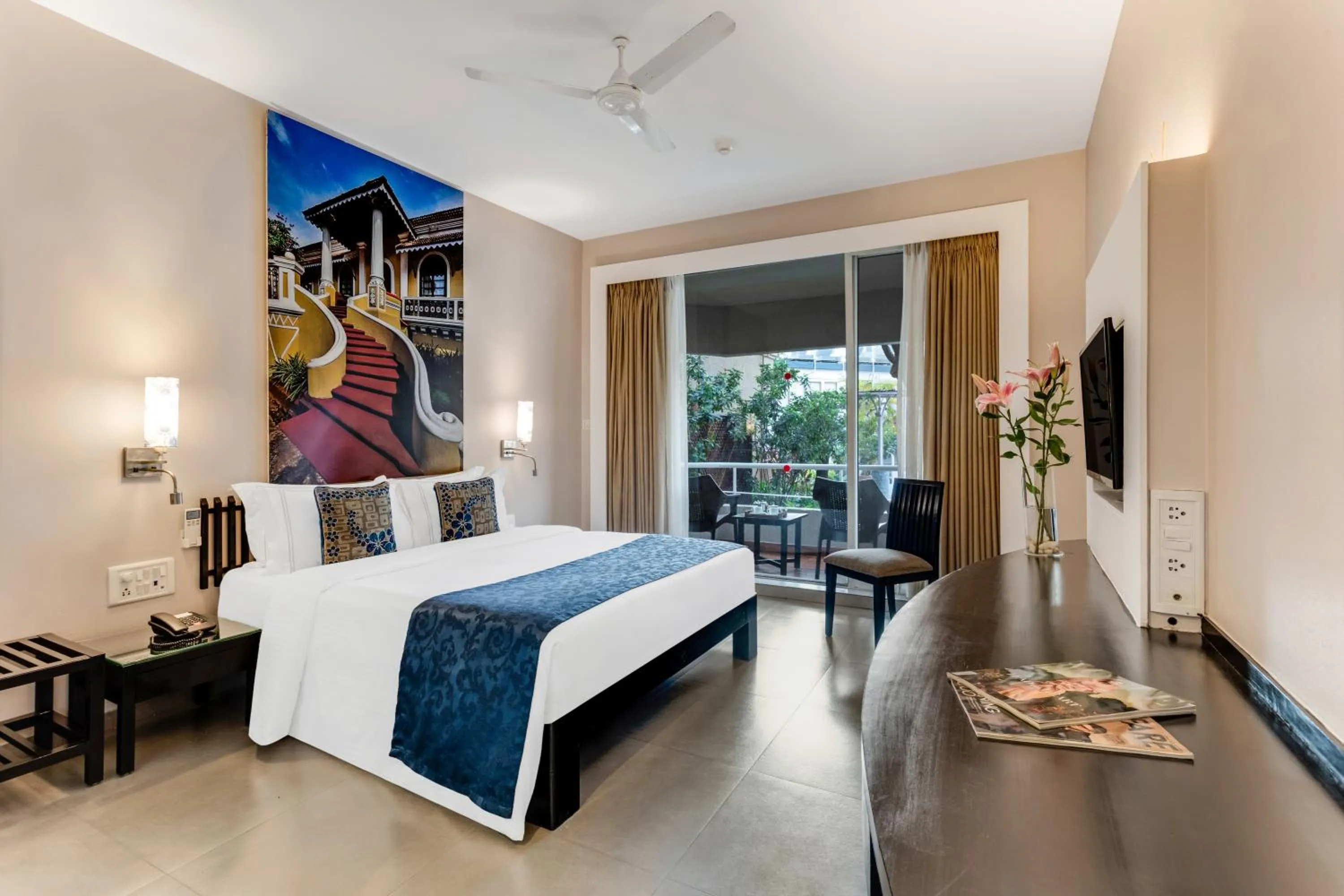 Bed in Whispering Palms Beach Resort