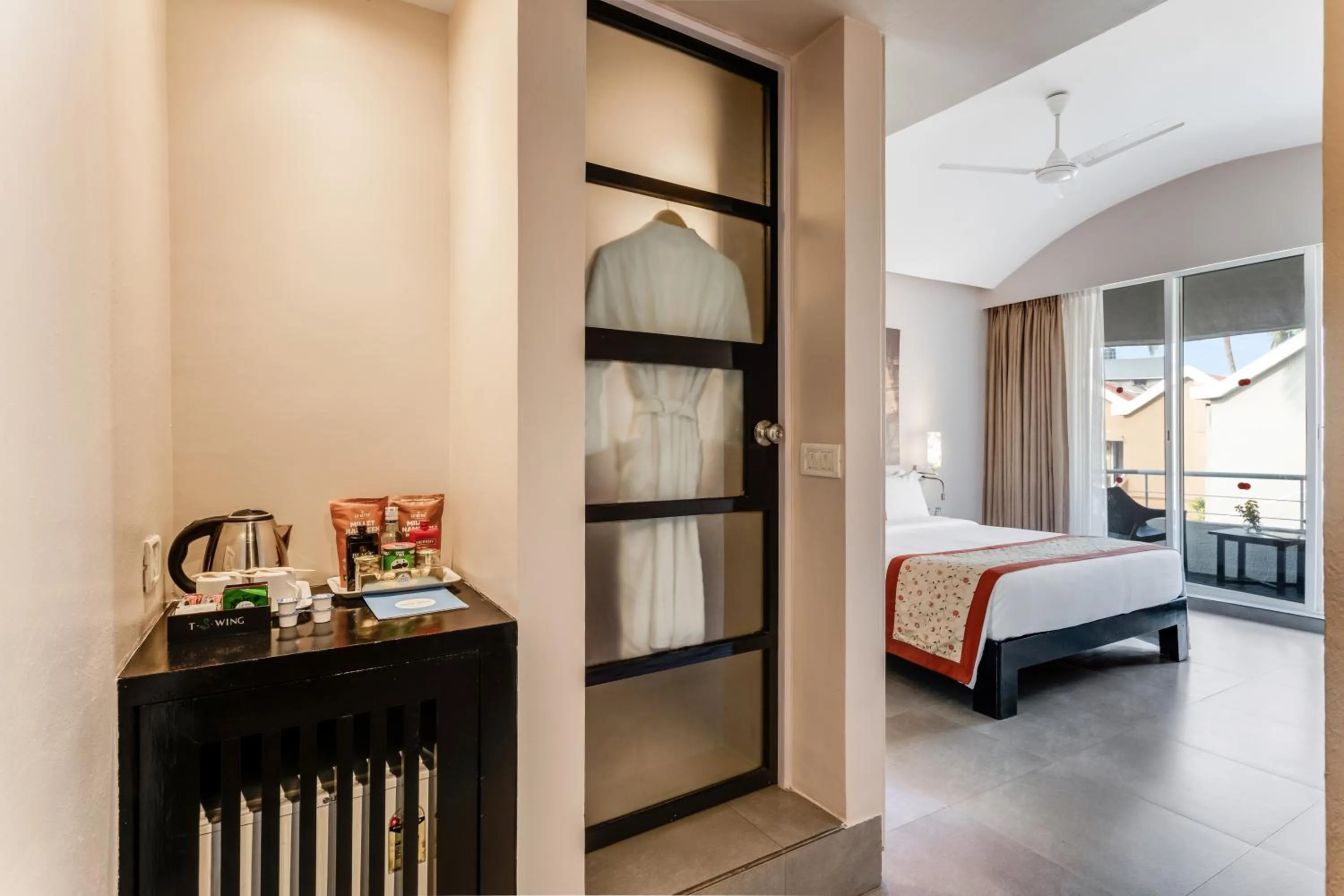 Bed in Whispering Palms Beach Resort