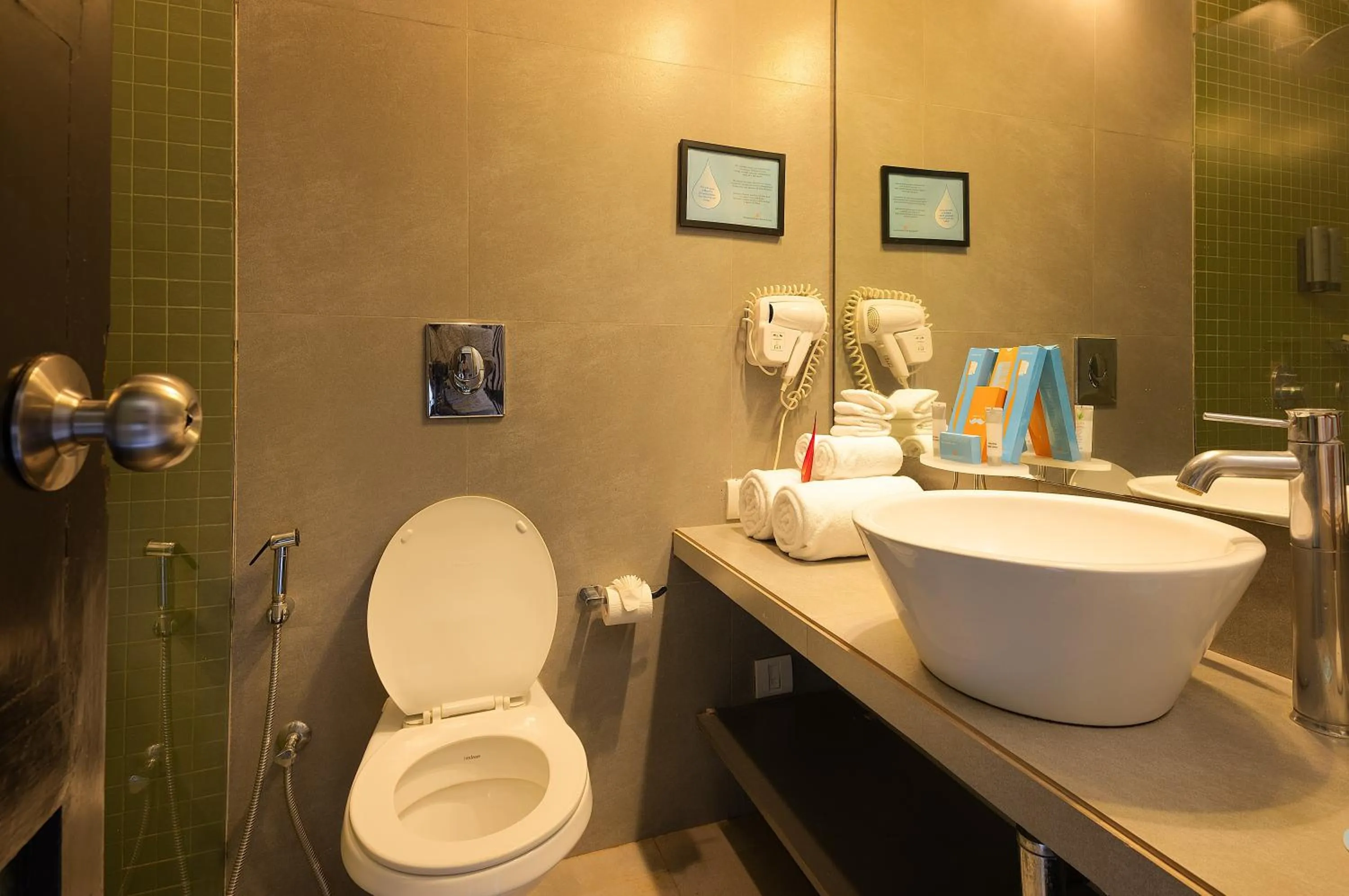 Toilet in Whispering Palms Beach Resort