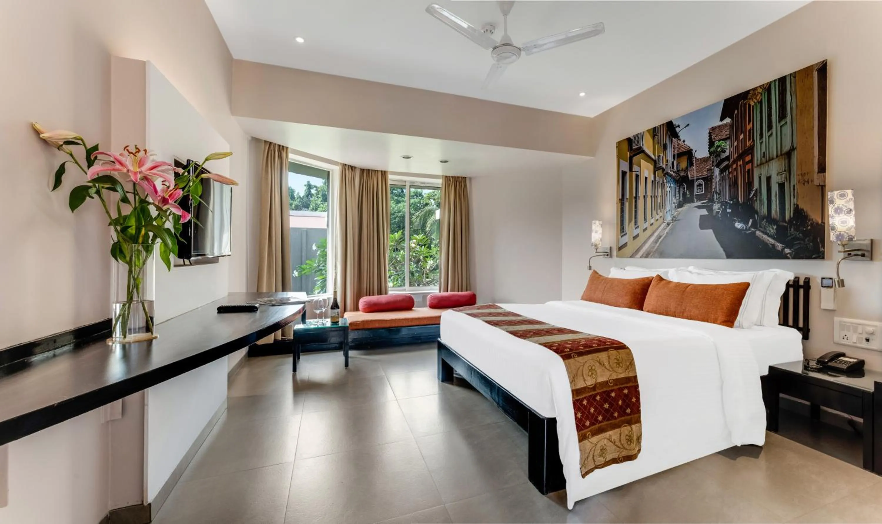 Bed in Whispering Palms Beach Resort