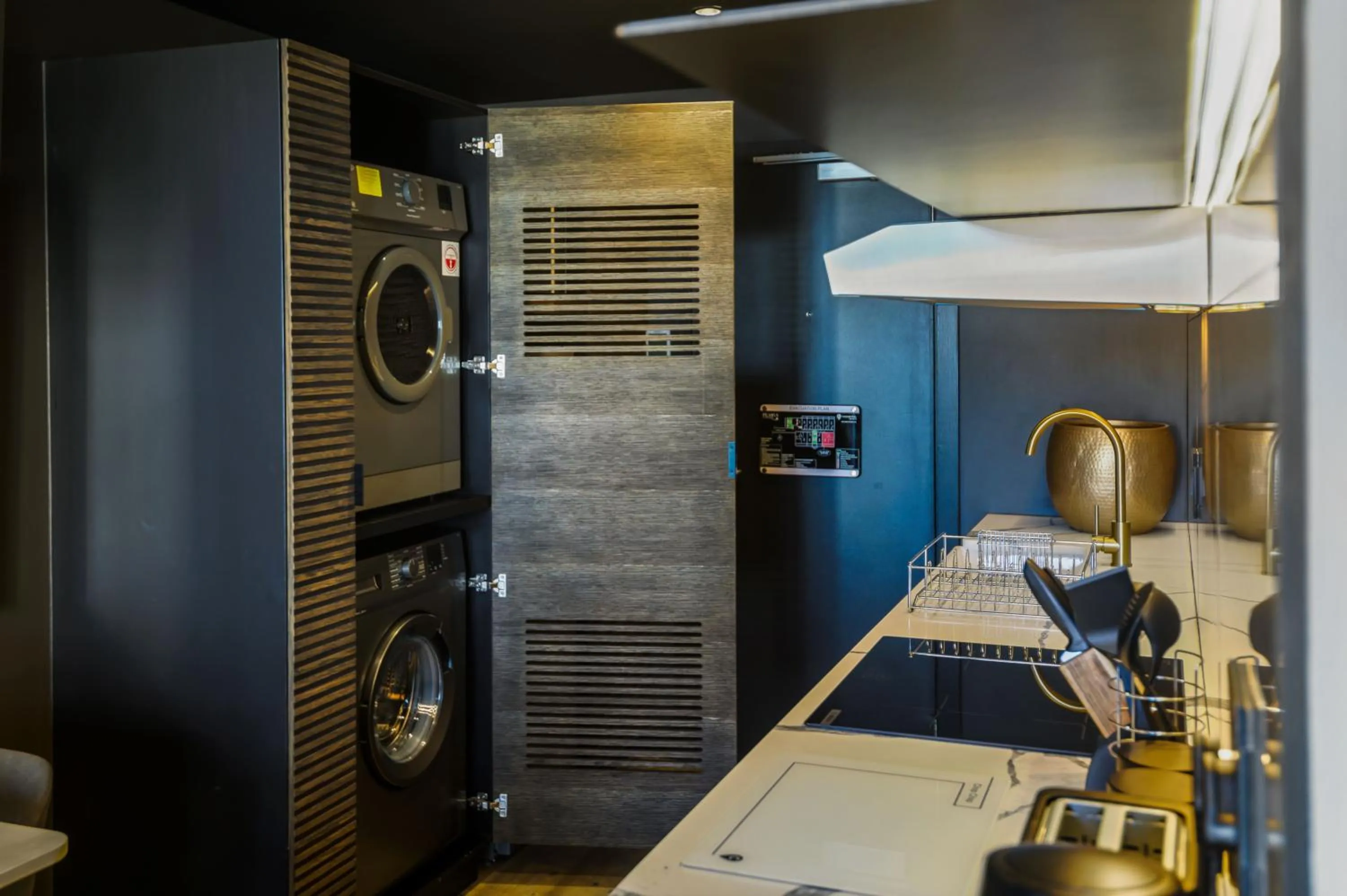 washing machine in The Capital Pearls Hotel