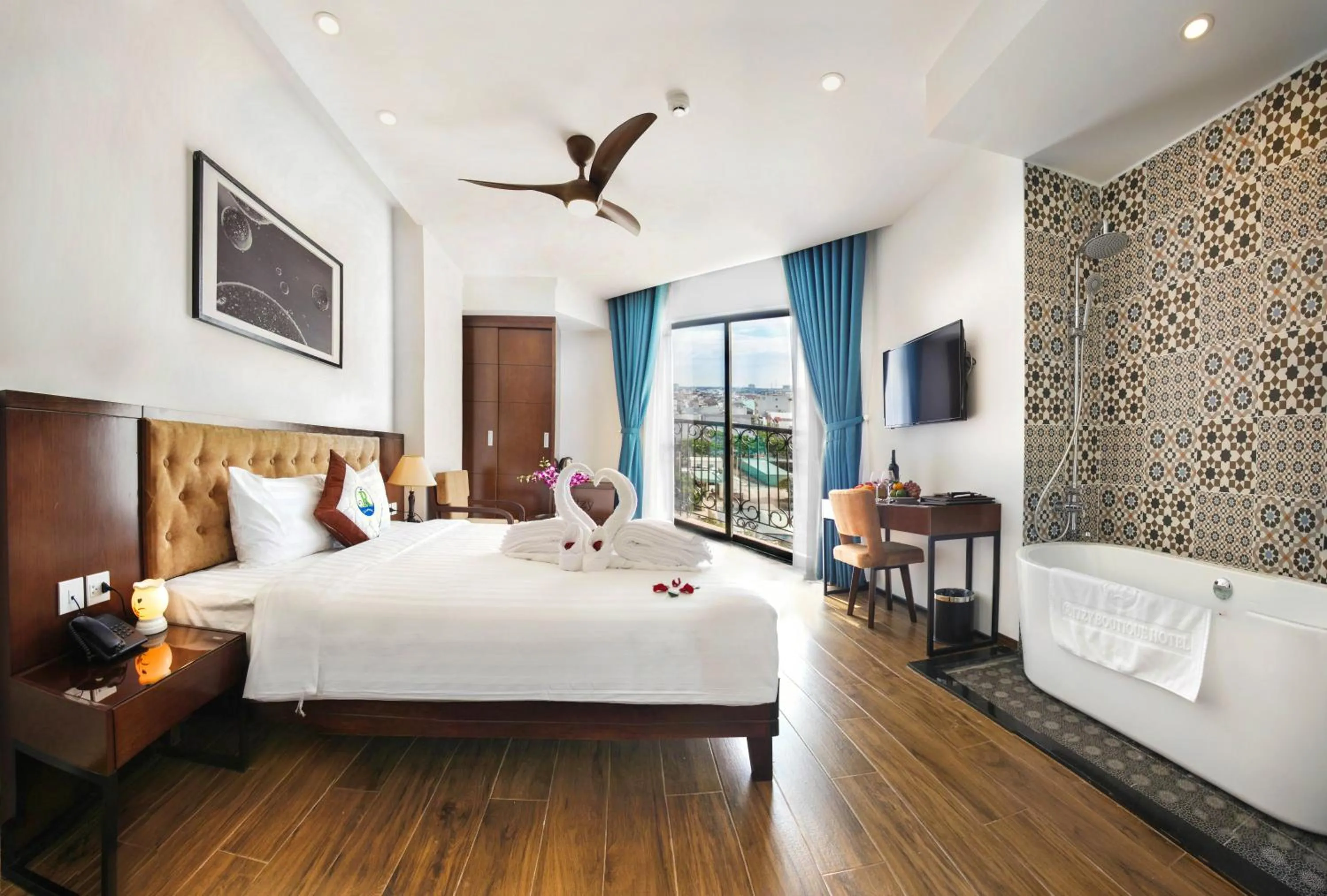 Photo of the whole room, Bed in Ritzy Boutique Hotel Da Nang Beach