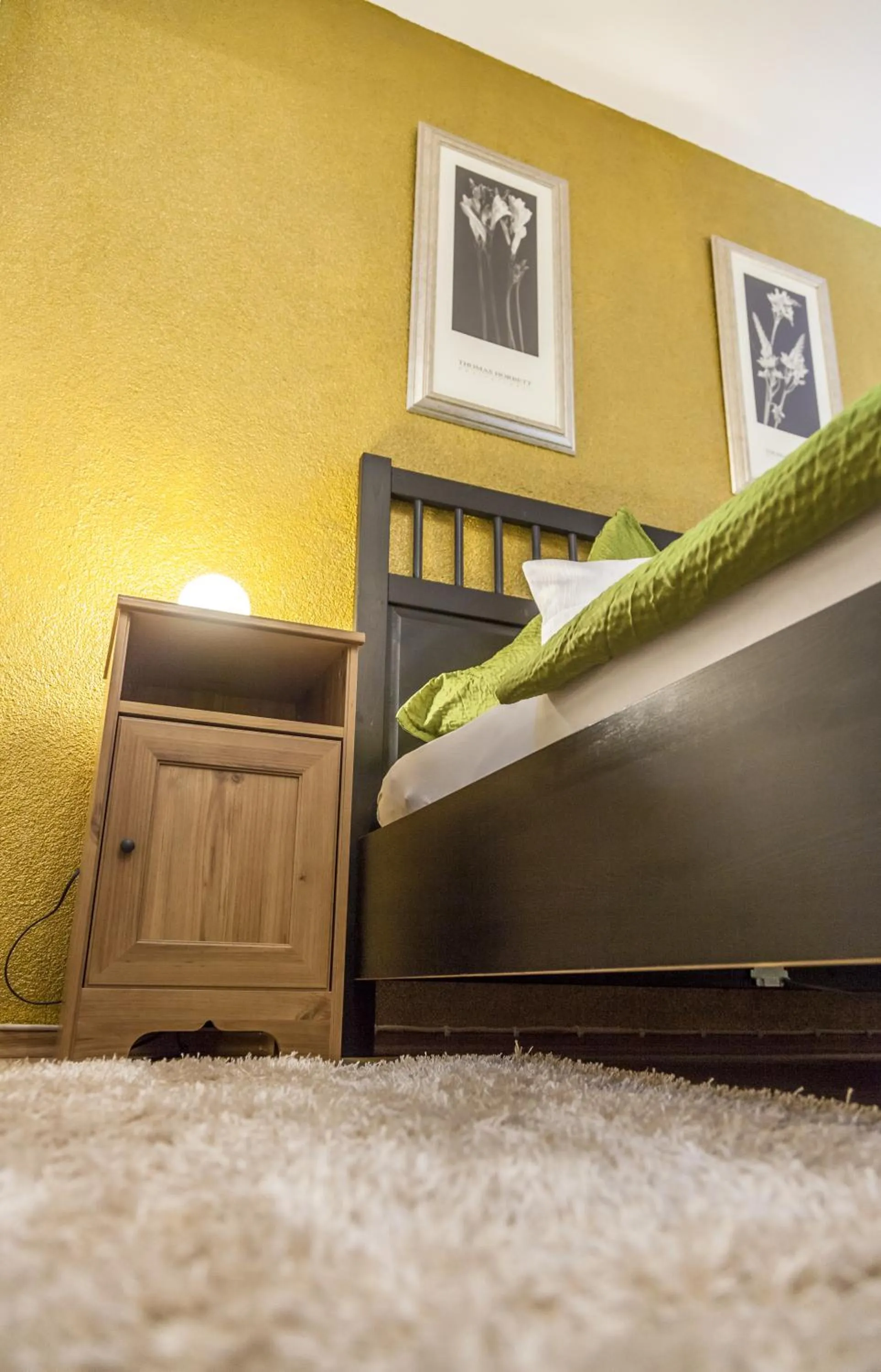 Decorative detail, Bed in Hotel-Gasthof Wilder Mann