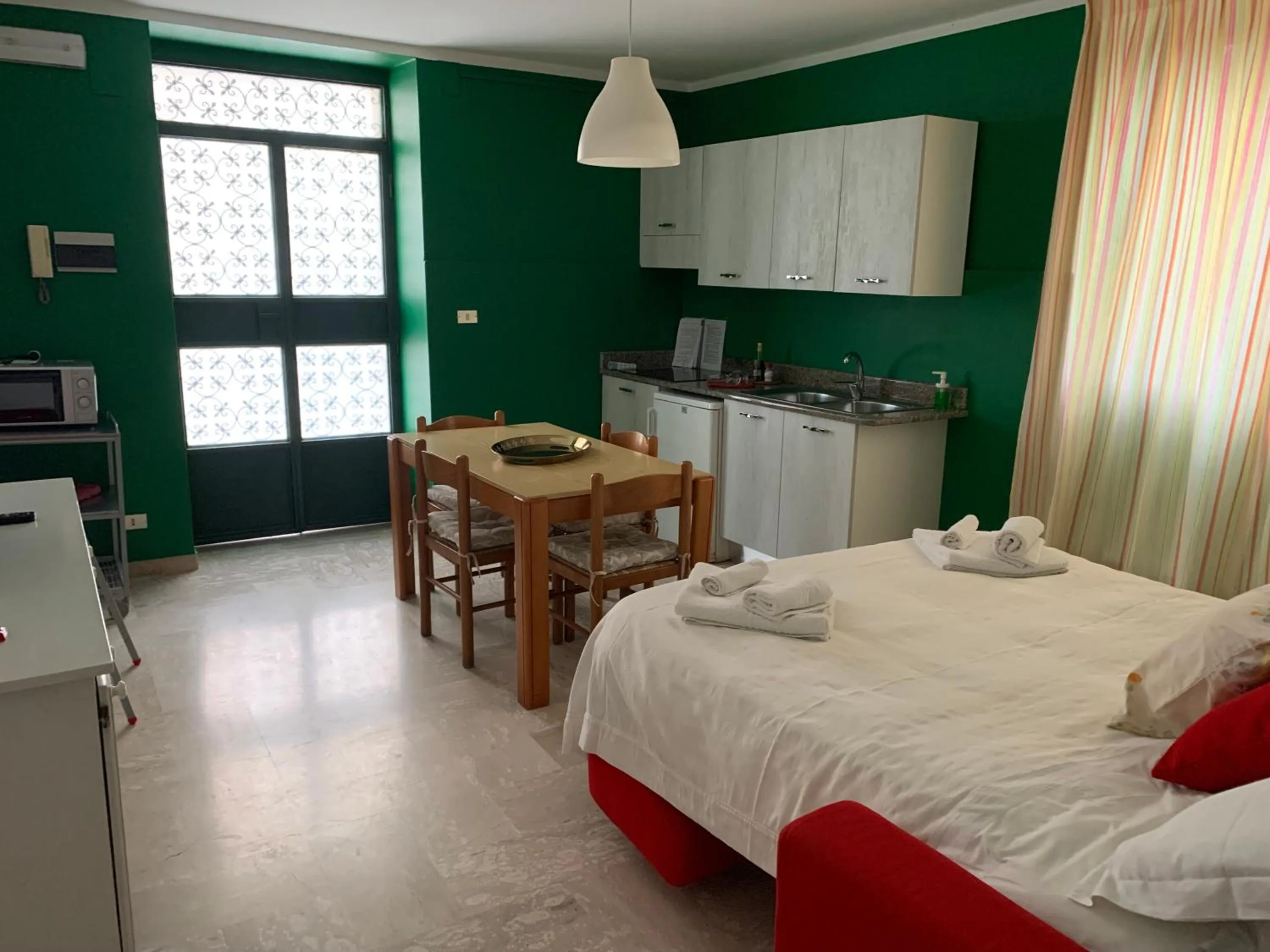 kitchen, Bed in Residenza Giancesare Family Apartments
