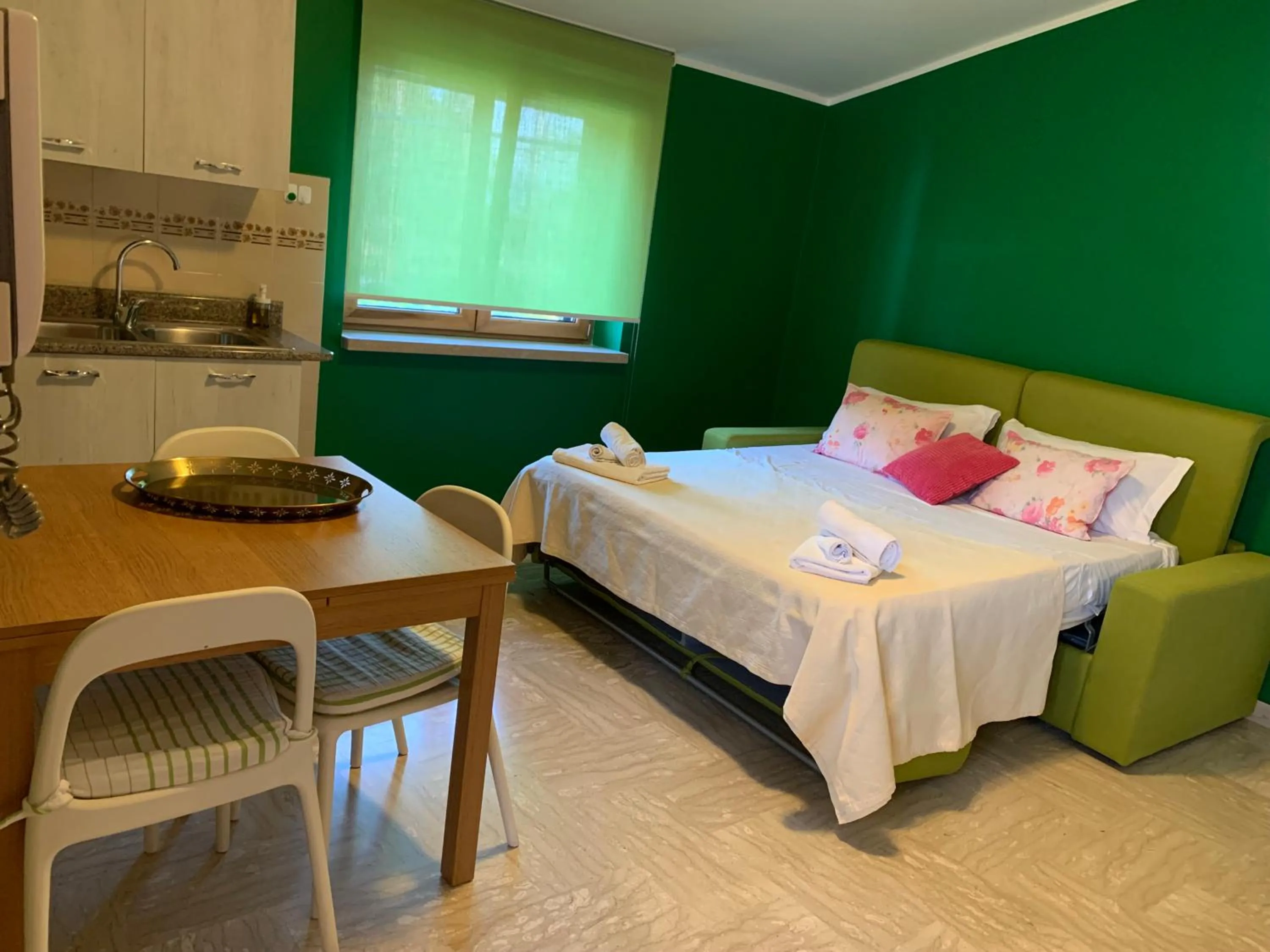 Living room, Bed in Residenza Giancesare Family Apartments