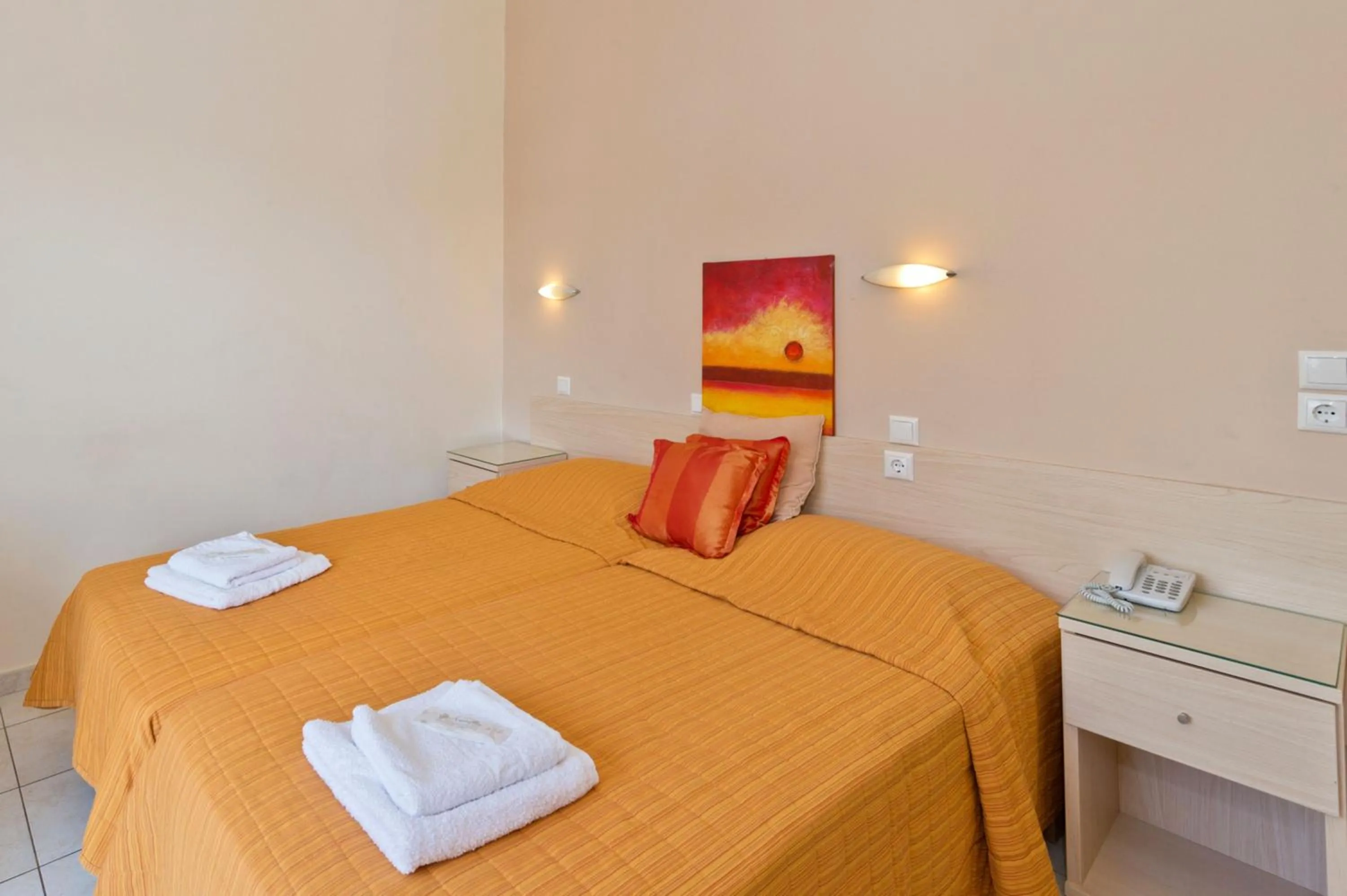 Bedroom in Amaryllis Hotel