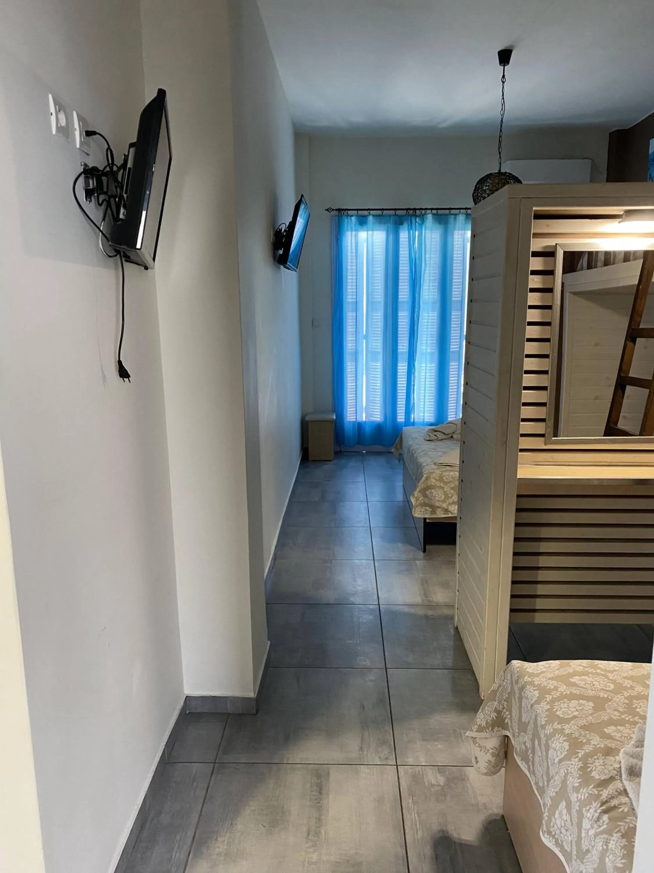 TV/Entertainment Center in Amaryllis Hotel