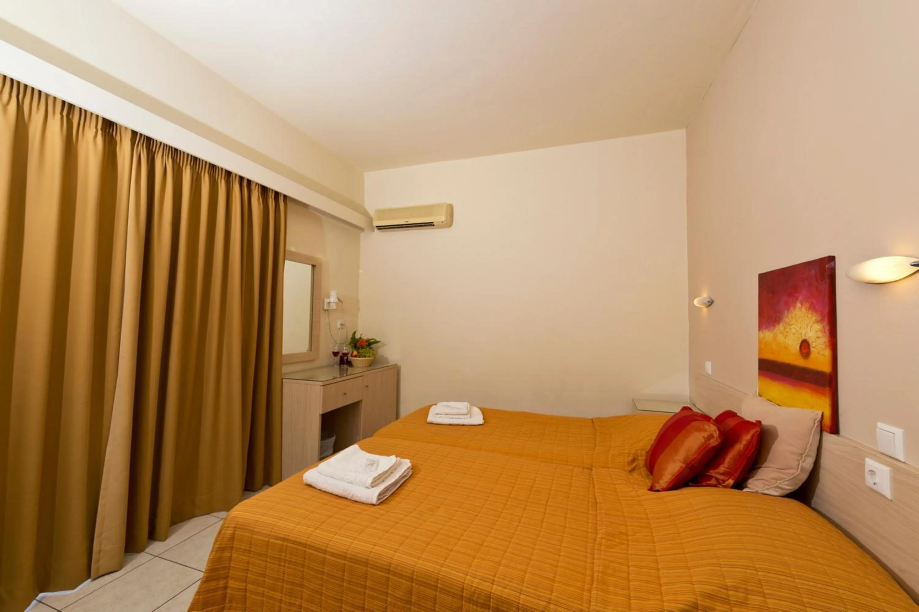 Bedroom in Amaryllis Hotel