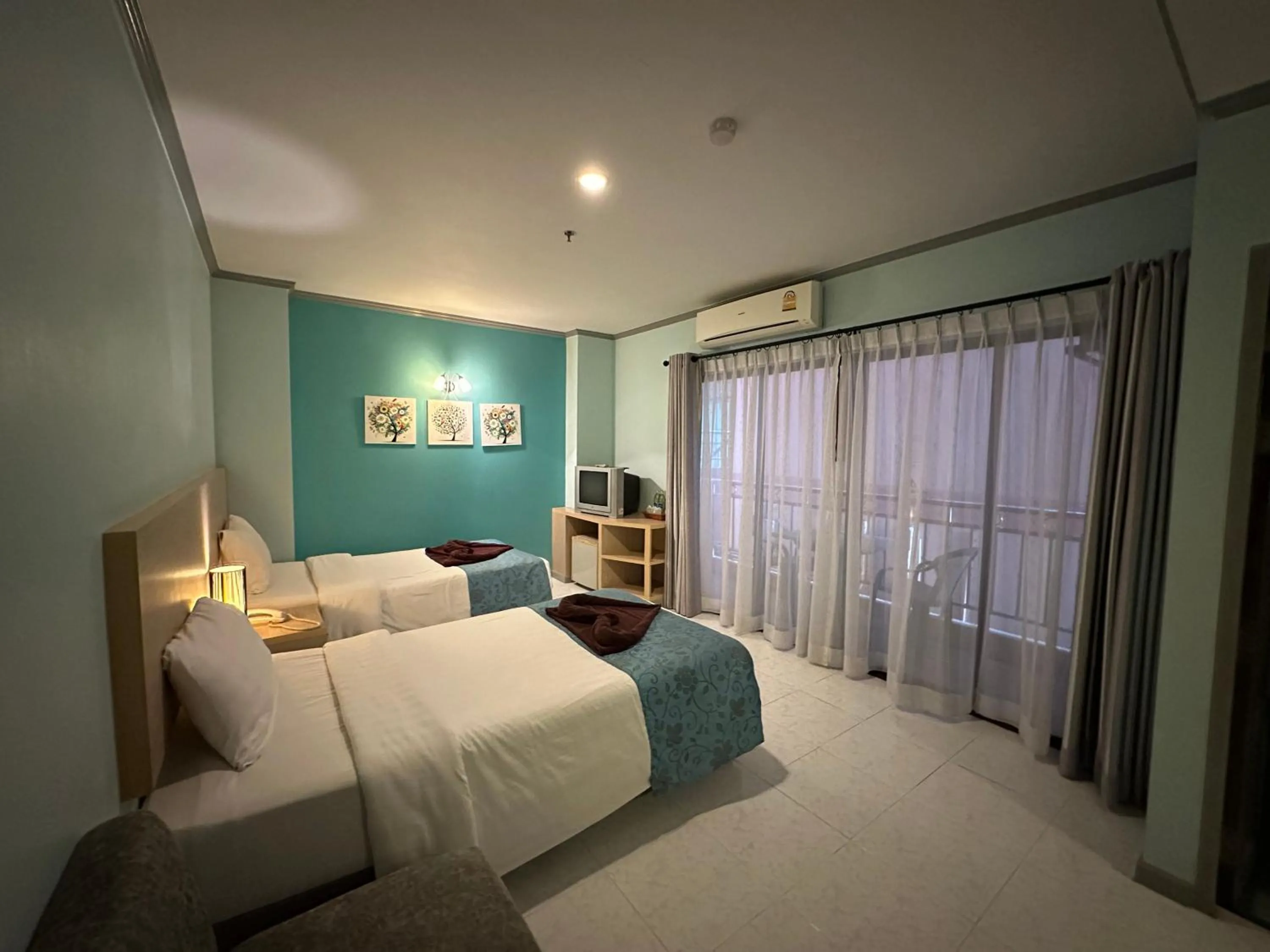 Bed in Thipurai City Hotel