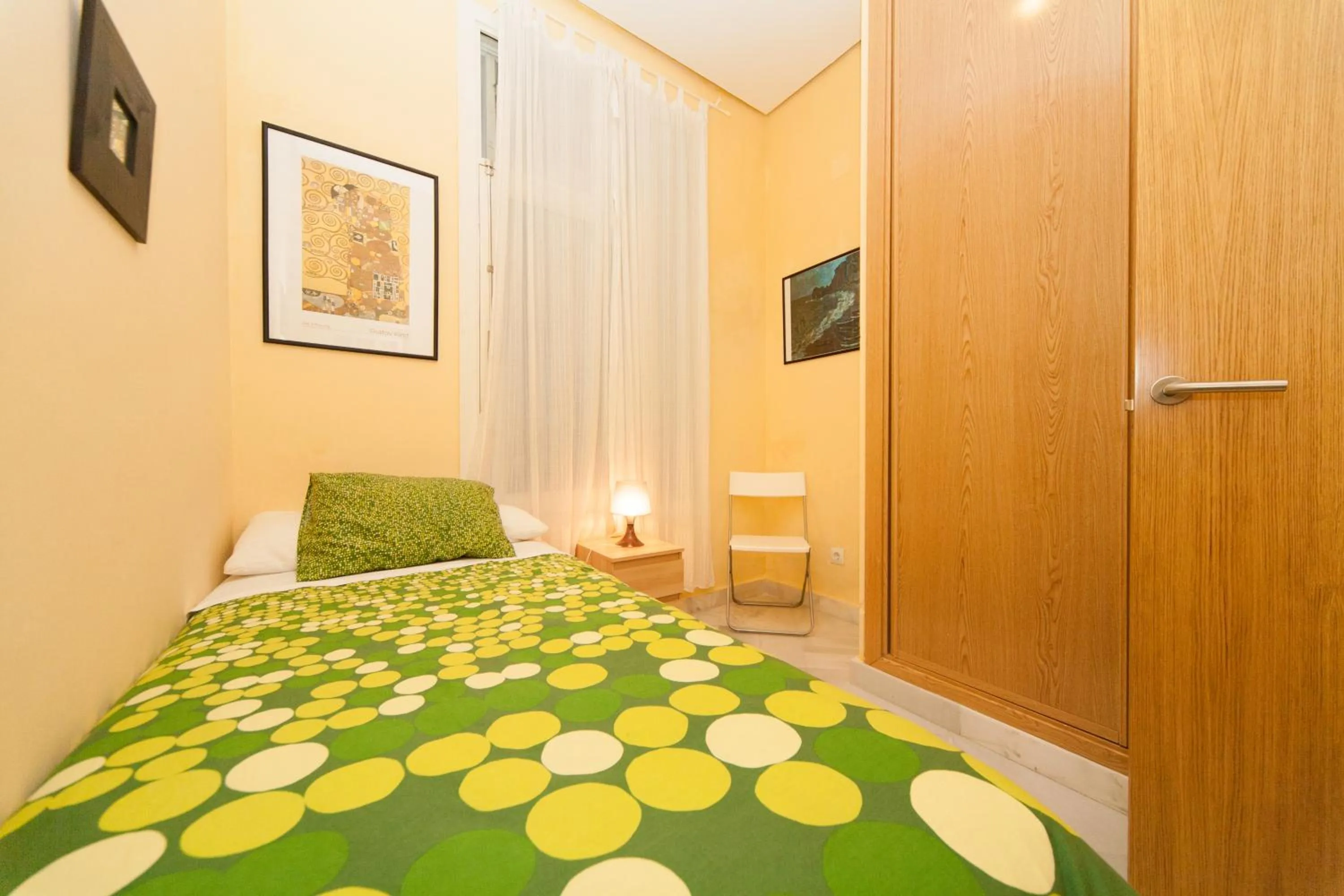 Bed in La Casa del Conde de Gelves Apartments