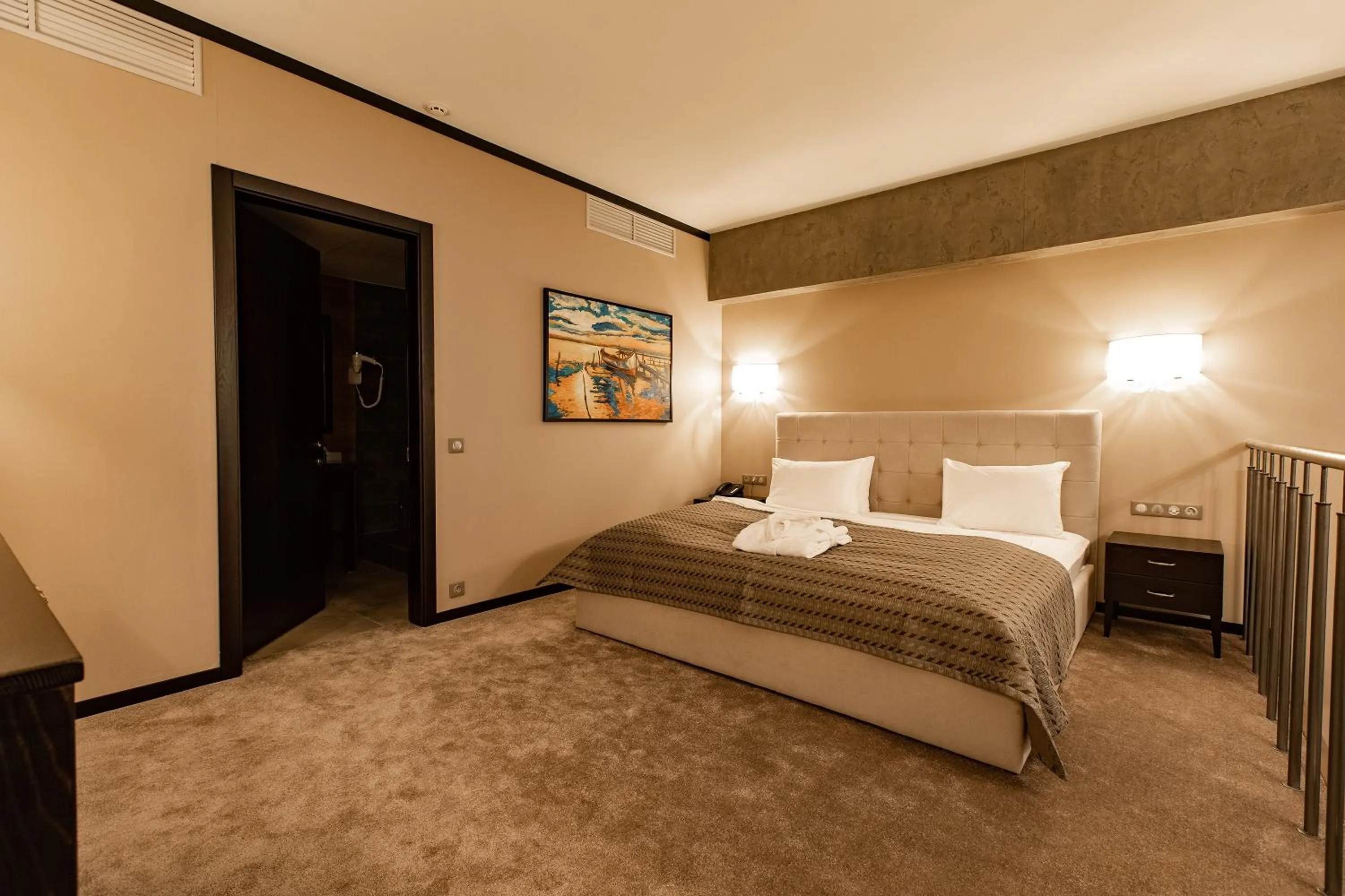 Bed in Tsunami Spa Hotel