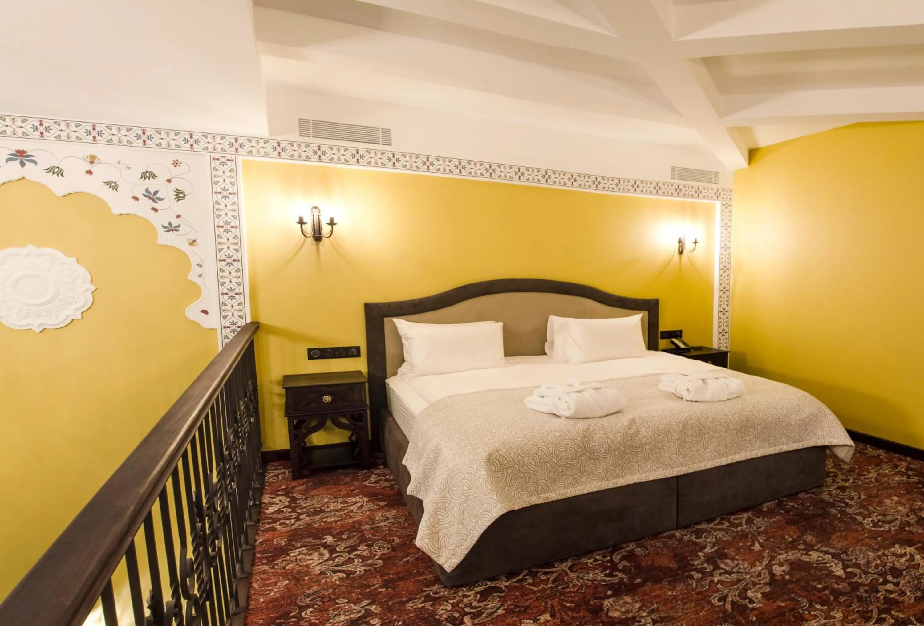 Bed in Tsunami Spa Hotel