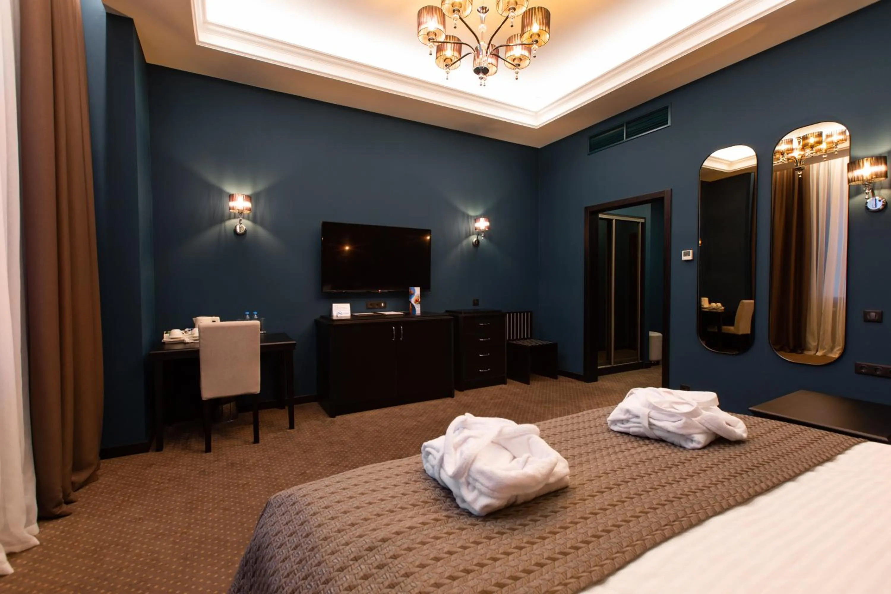 Bed in Tsunami Spa Hotel