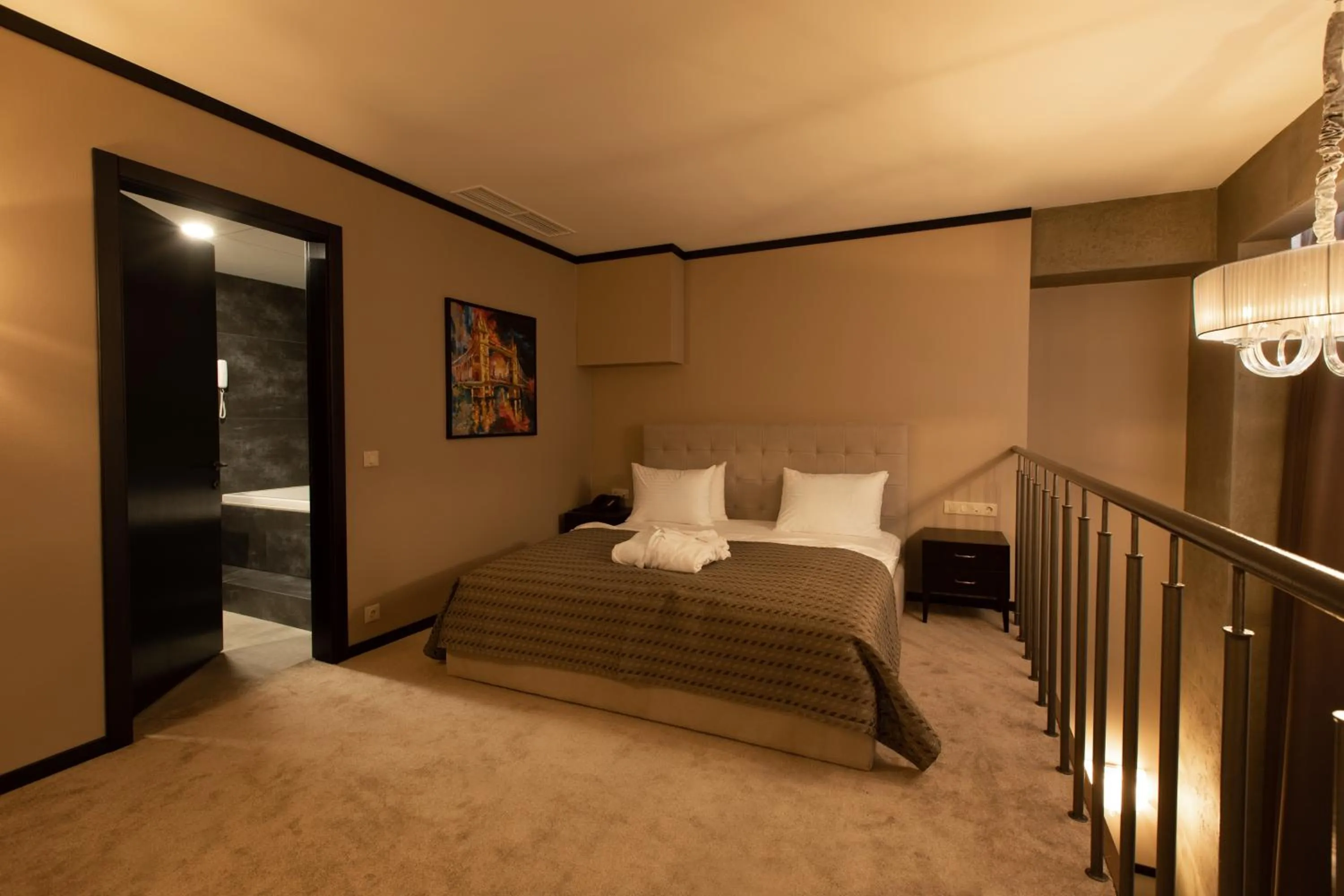 Bed in Tsunami Spa Hotel