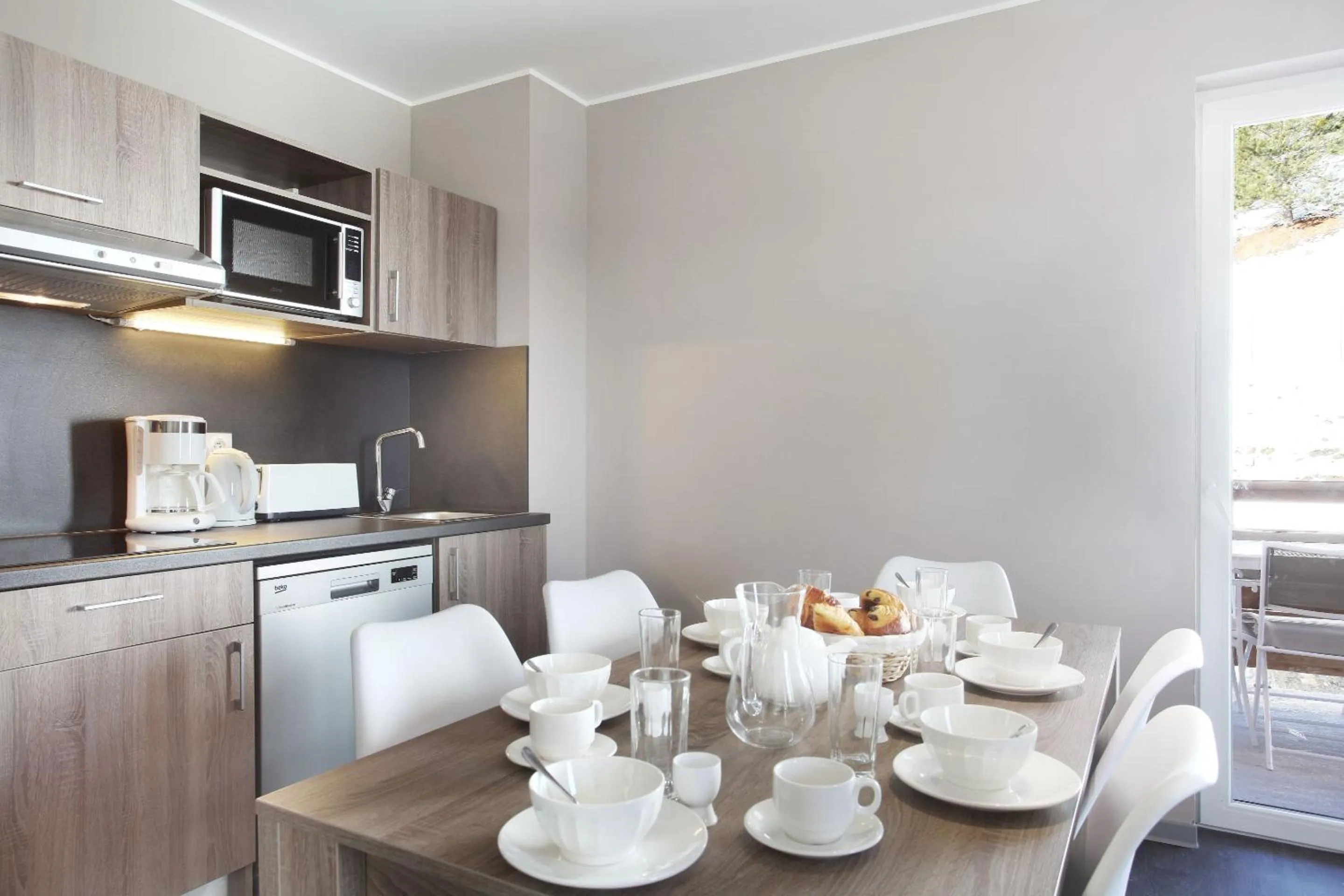 Kitchen or kitchenette in Résidence Odalys Le Village de Praroustan