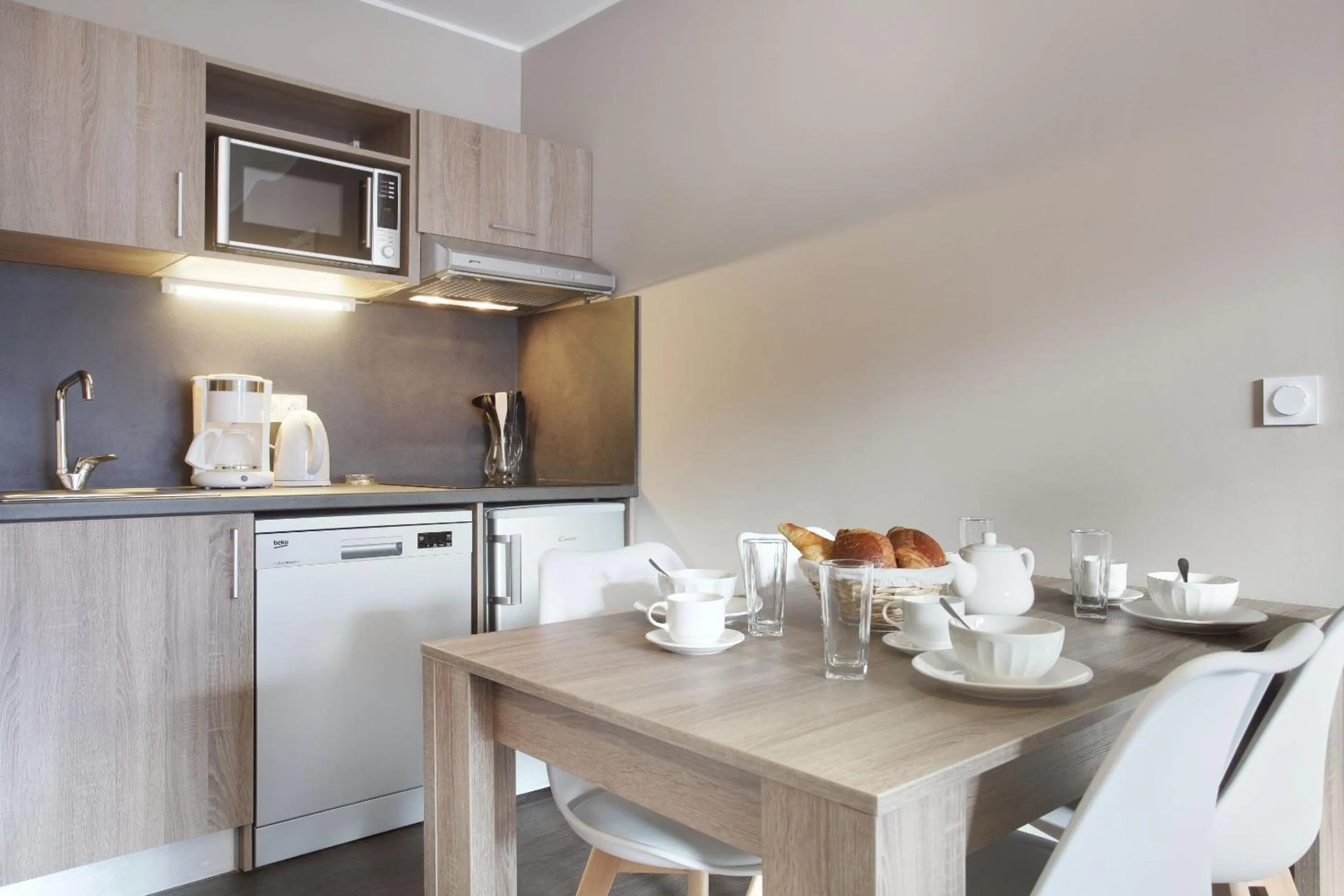 Kitchen or kitchenette in Résidence Odalys Le Village de Praroustan