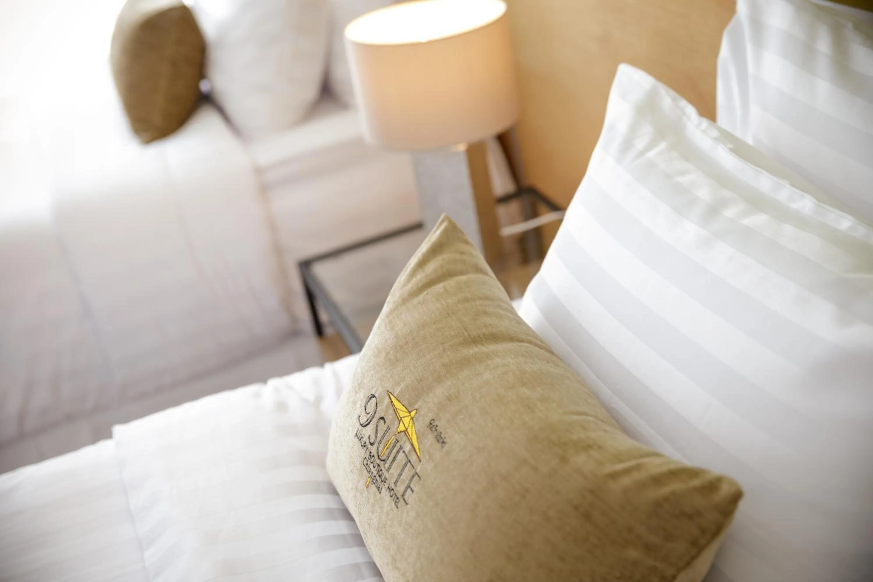 Bed in 9 SUITE Luxury Boutique Hotel