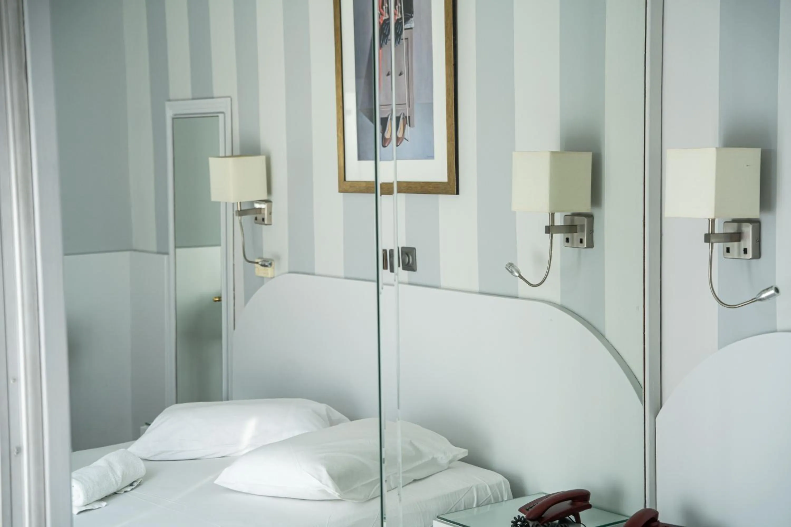 Bed in Eva Hotel Piraeus