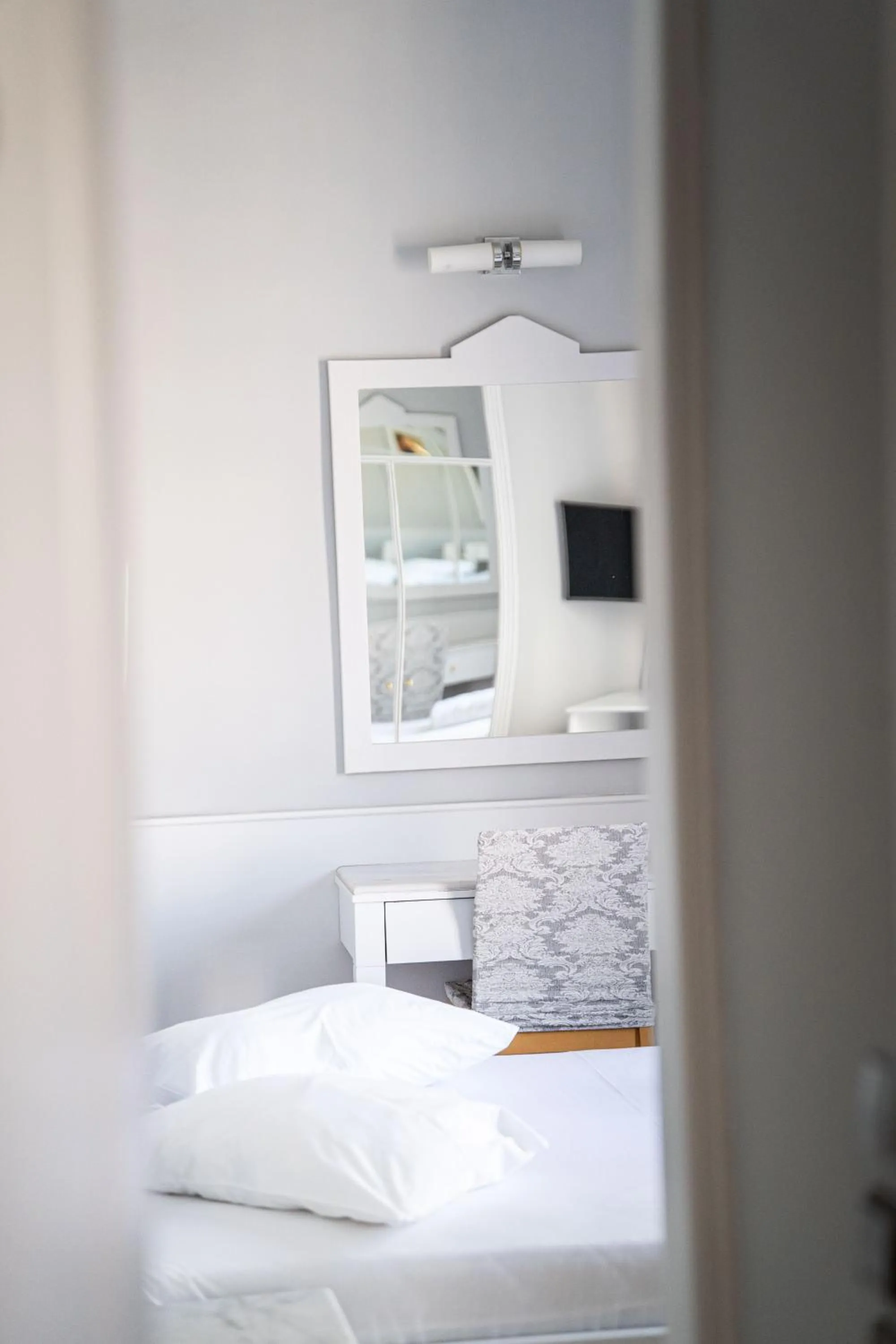 Bed in Eva Hotel Piraeus