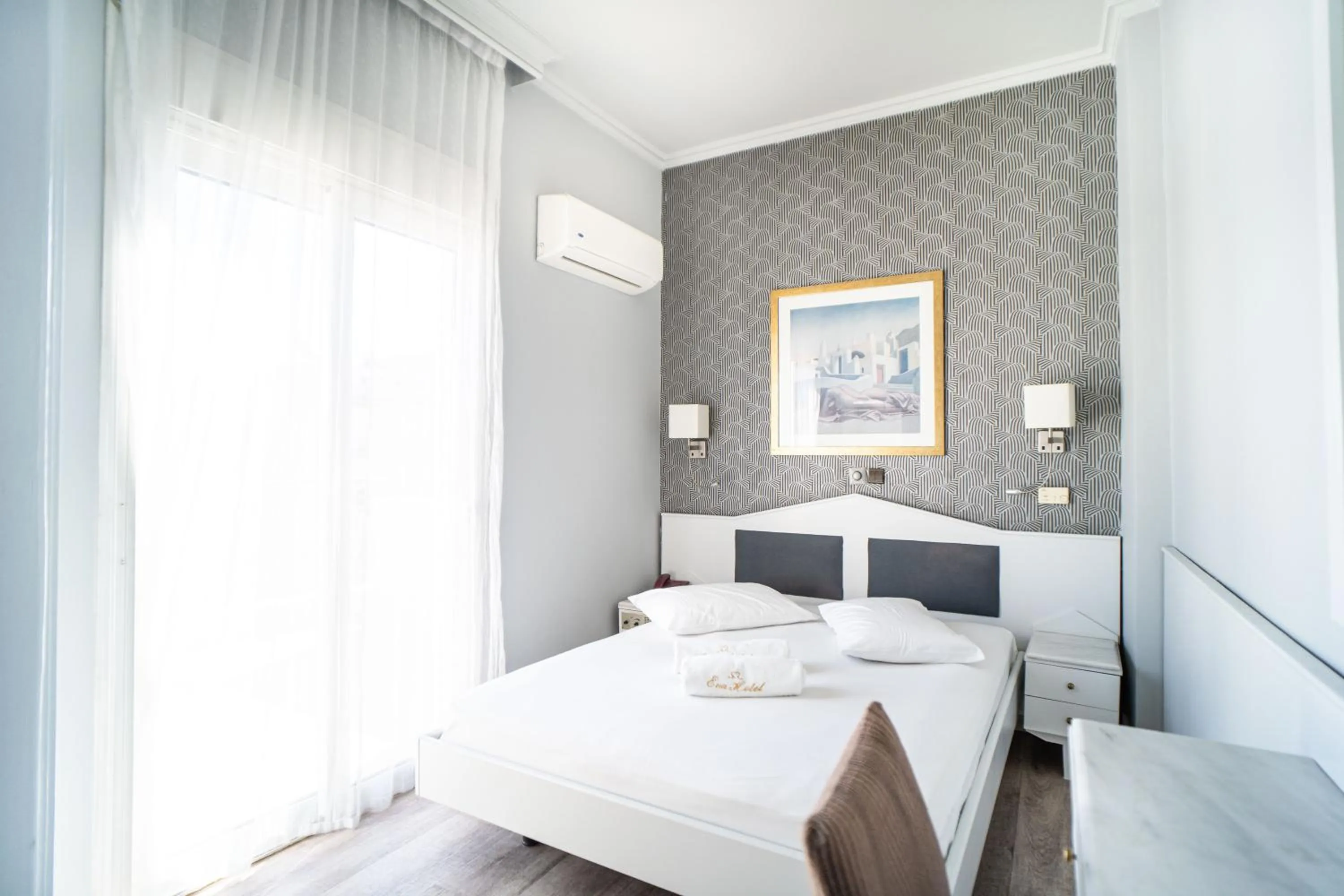 Bed in Eva Hotel Piraeus