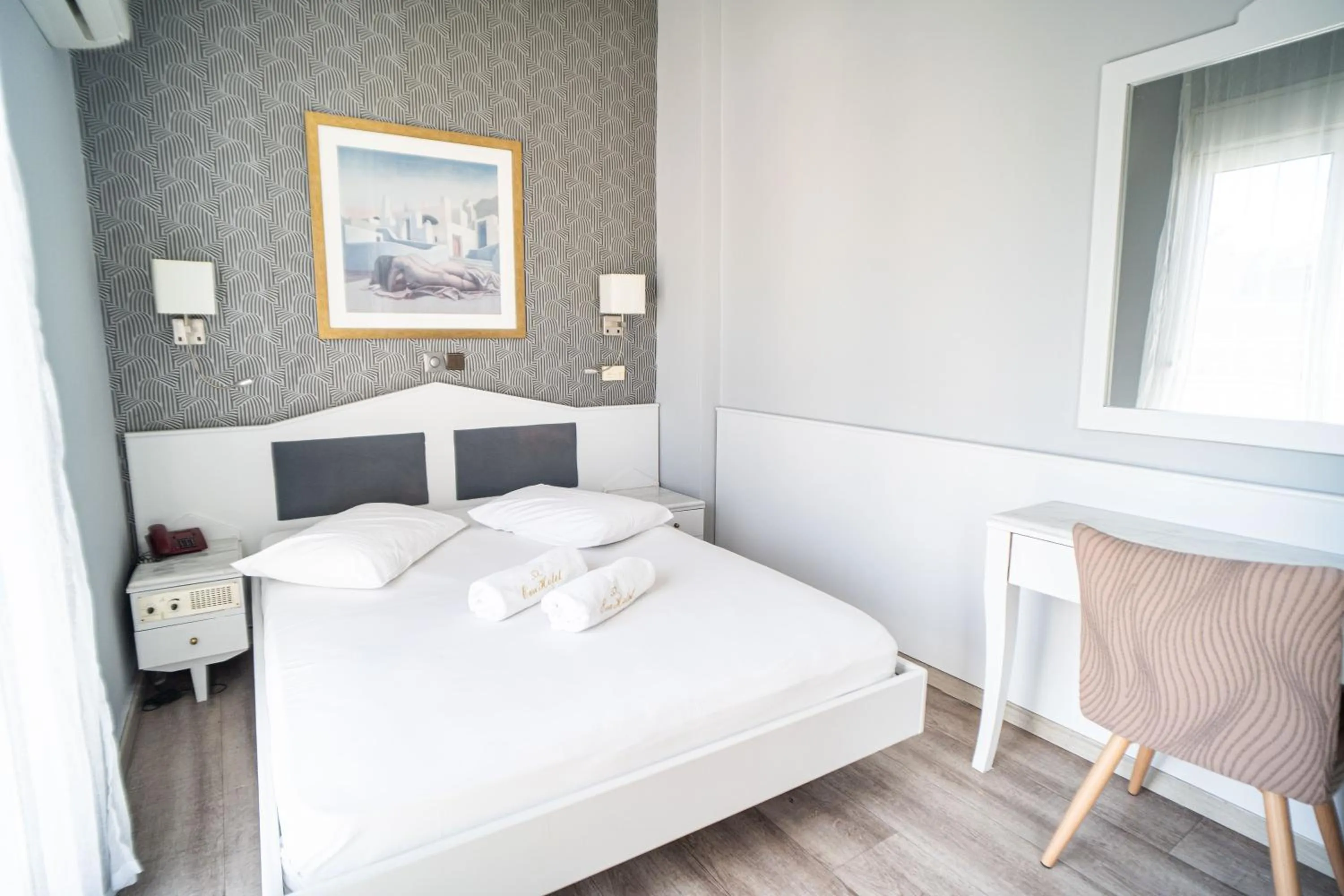 Bed in Eva Hotel Piraeus