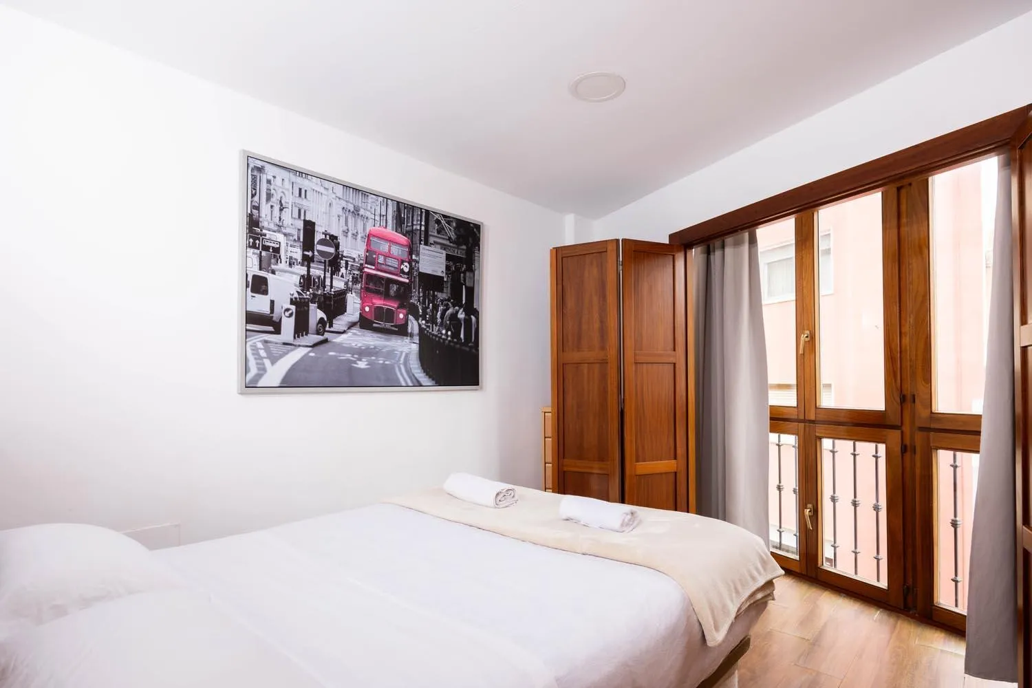 Bed in Apartamentos Turísticos Distrito Romano by CartagenaSpain