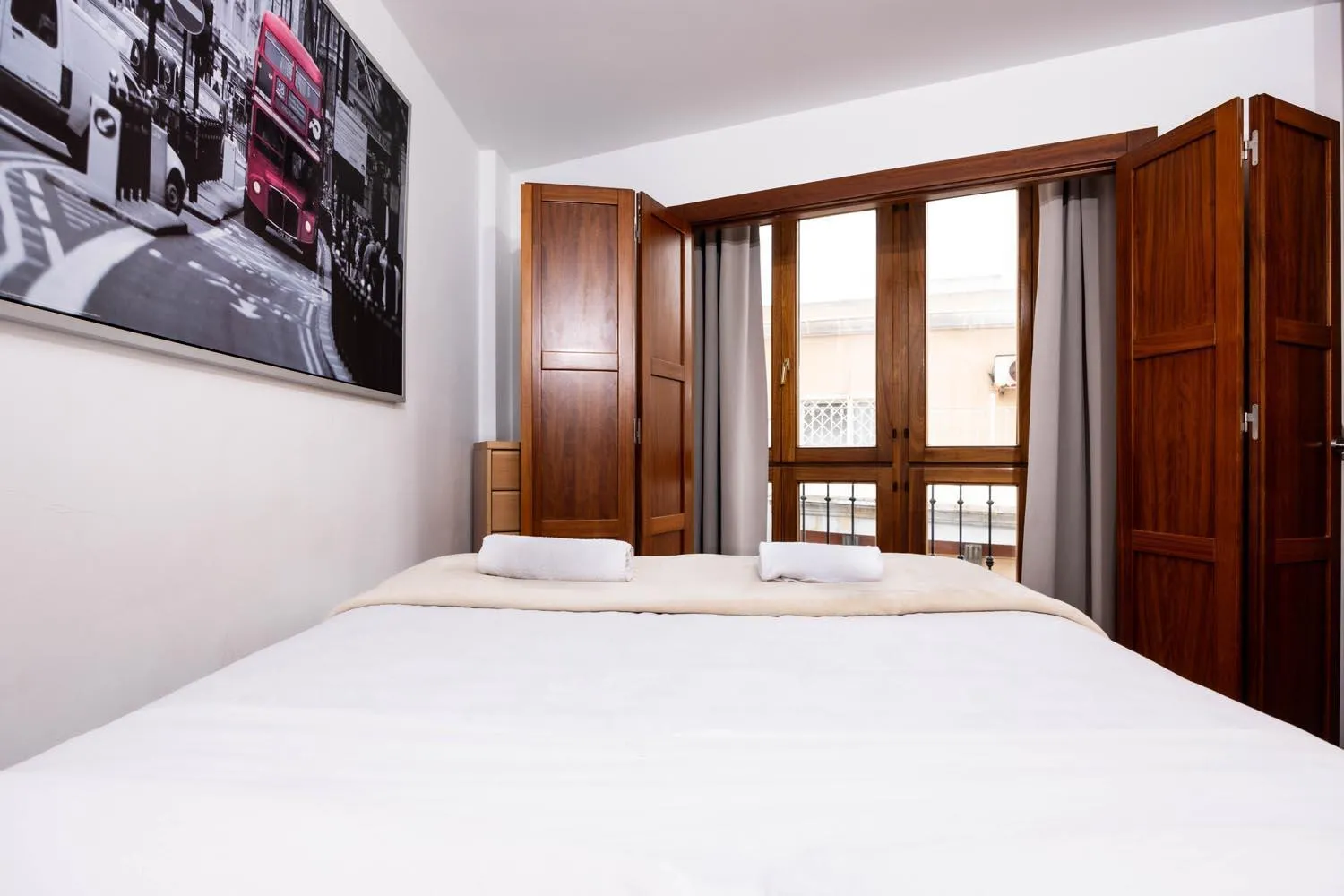Bed in Apartamentos Turísticos Distrito Romano by CartagenaSpain