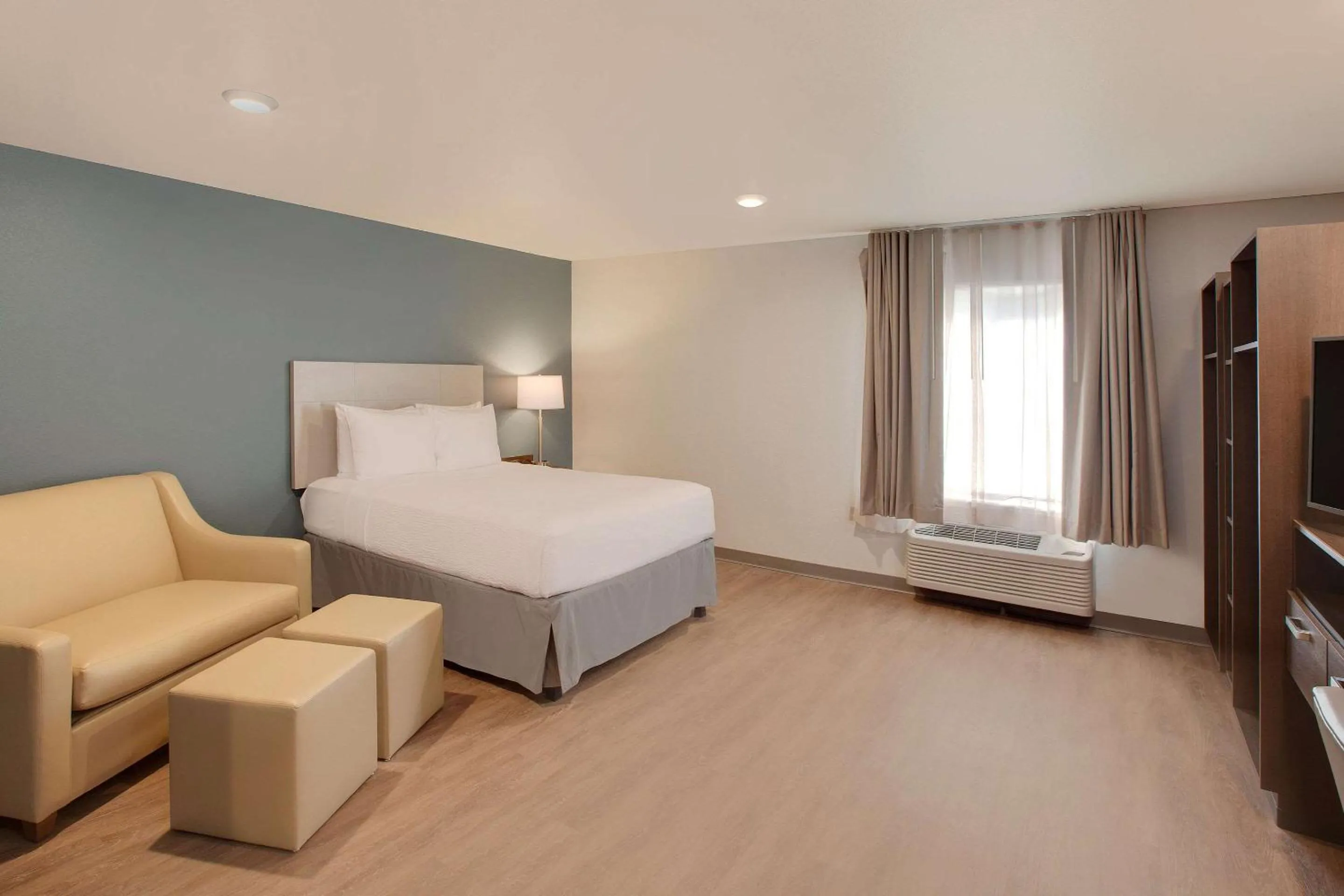 Photo of the whole room, Bed in WoodSpring Suites Houston Northwest